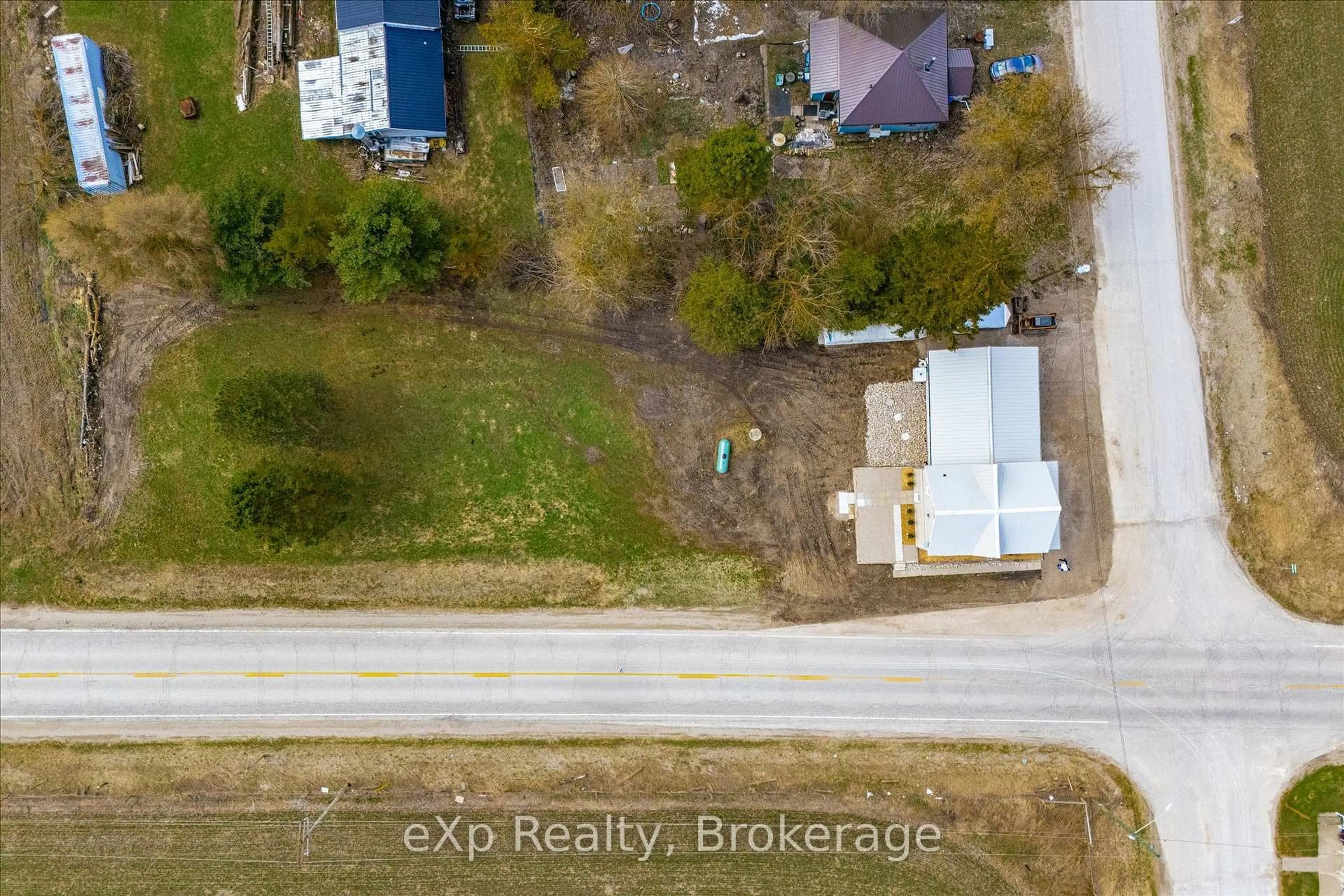 A pic from outside/outdoor area/front of a property/back of a property/a pic from drone, street for 9276 Wellington Rd 16, Wellington North Ontario N0G 2E0