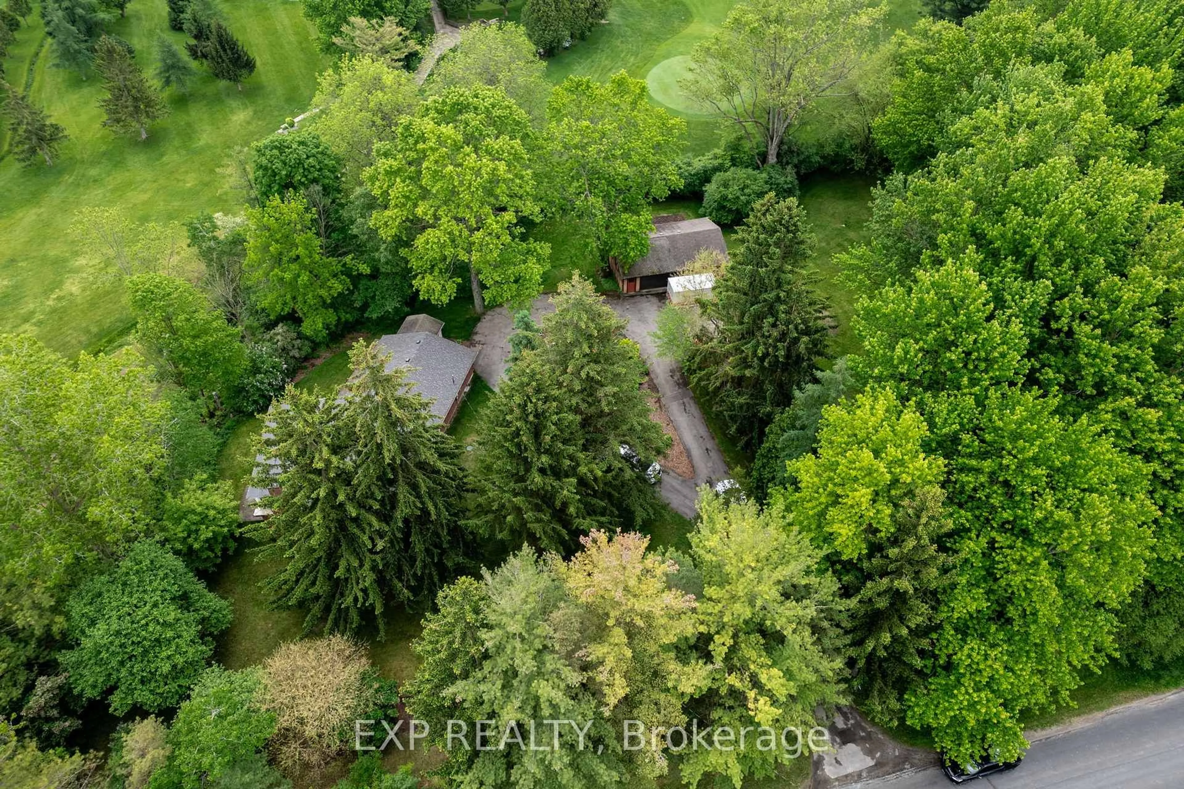 A pic from outside/outdoor area/front of a property/back of a property/a pic from drone, forest/trees view for 200 Harris Rd, Middlesex Centre Ontario N0L 1E0