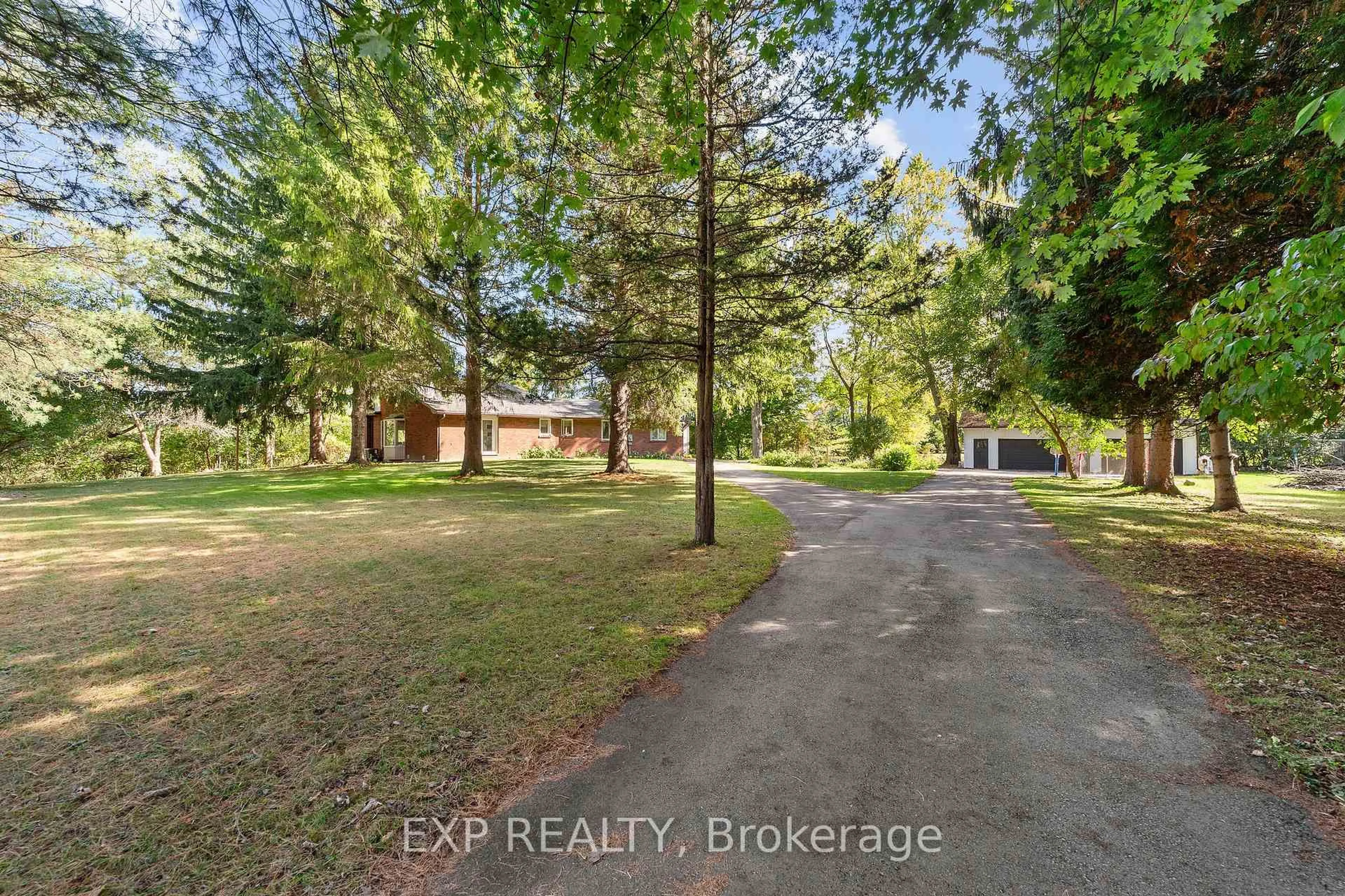 A pic from outside/outdoor area/front of a property/back of a property/a pic from drone, forest/trees view for 200 Harris Rd, Middlesex Centre Ontario N0L 1E0