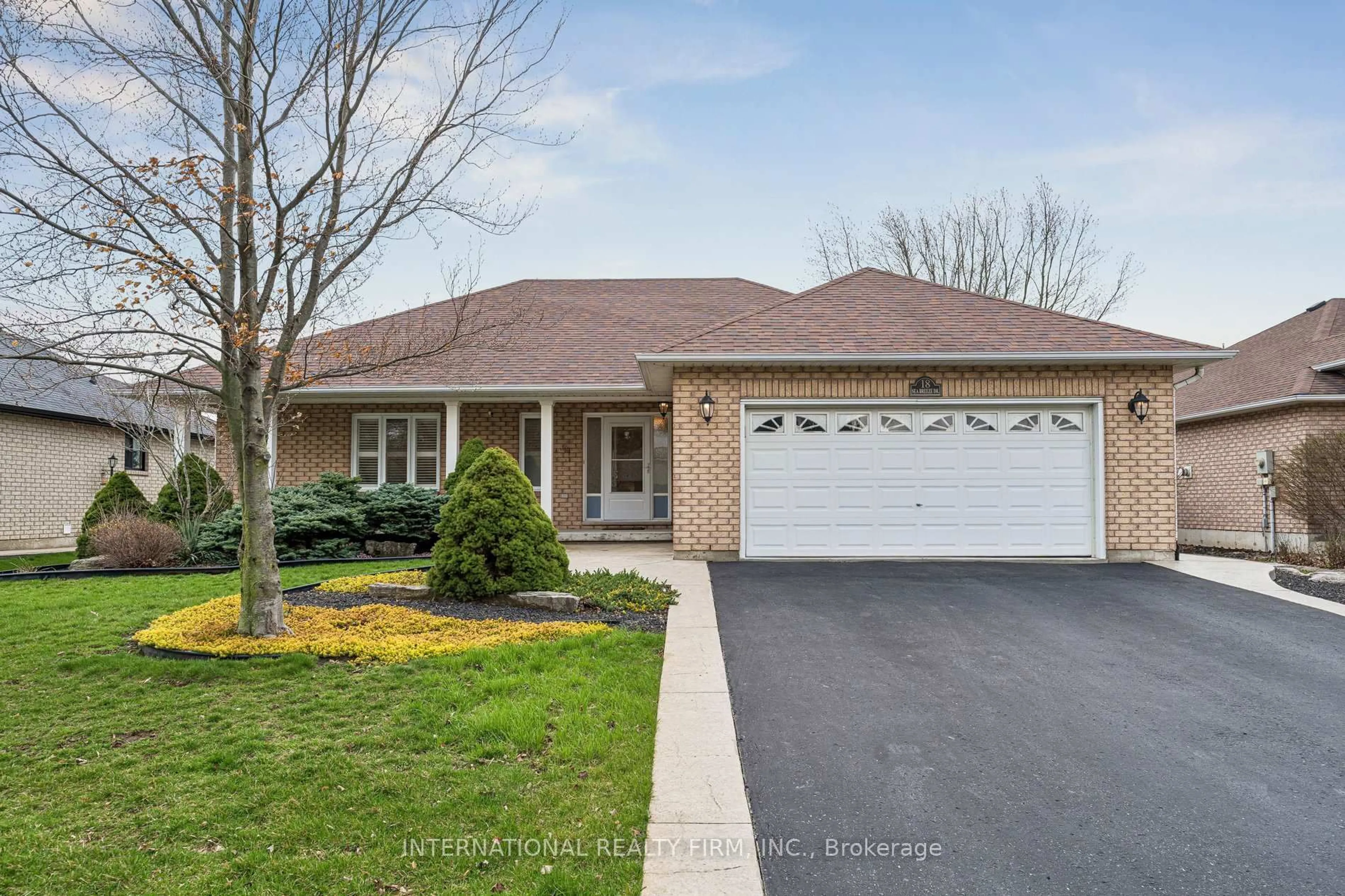 Home with brick exterior material, street for 18 Sea Breeze Dr, Norfolk Ontario N0A 1N7