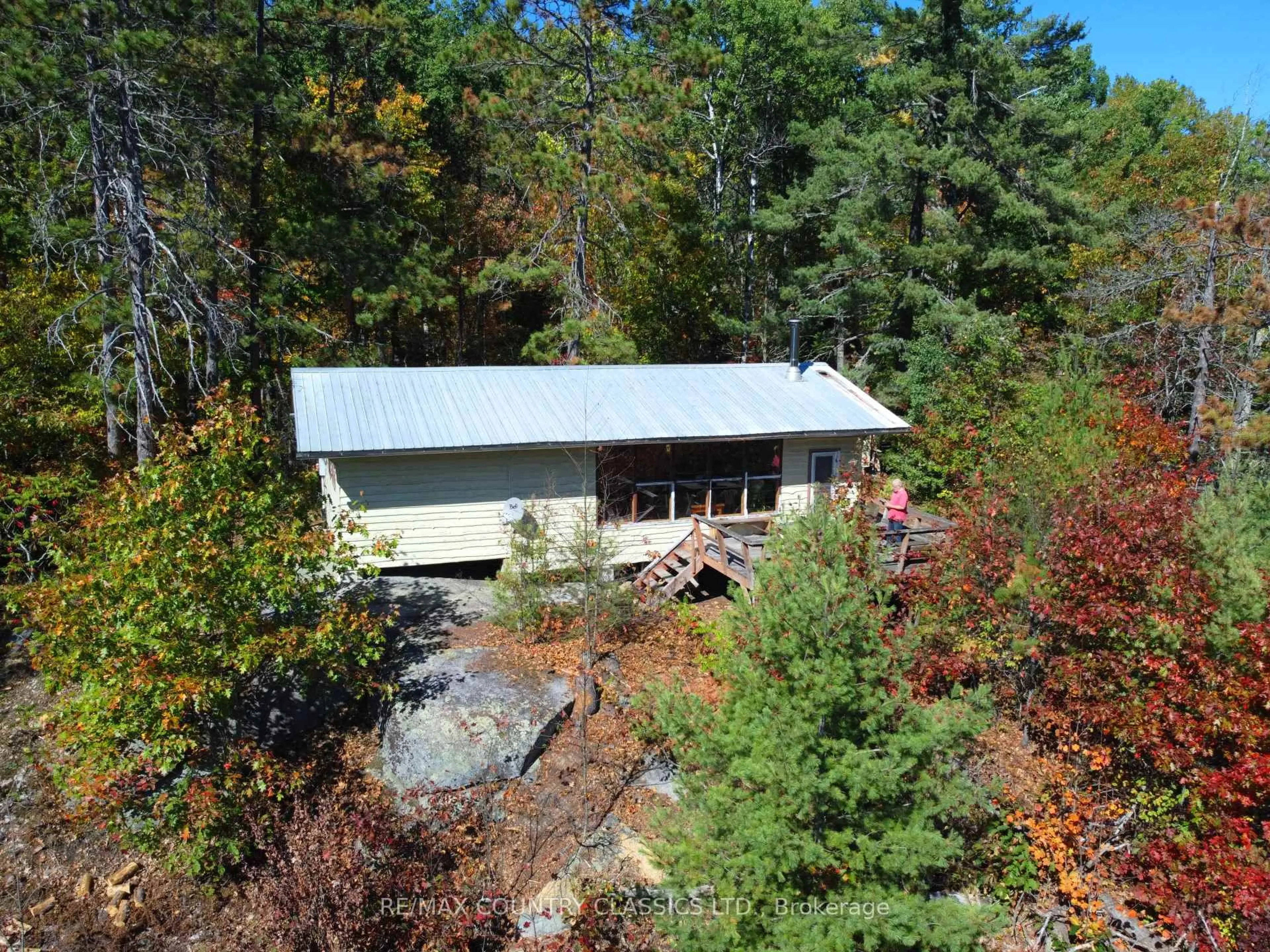 A pic from outside/outdoor area/front of a property/back of a property/a pic from drone, forest/trees view for 738 Dam Lake Rd, Barry's Bay Ontario K0J 1B0