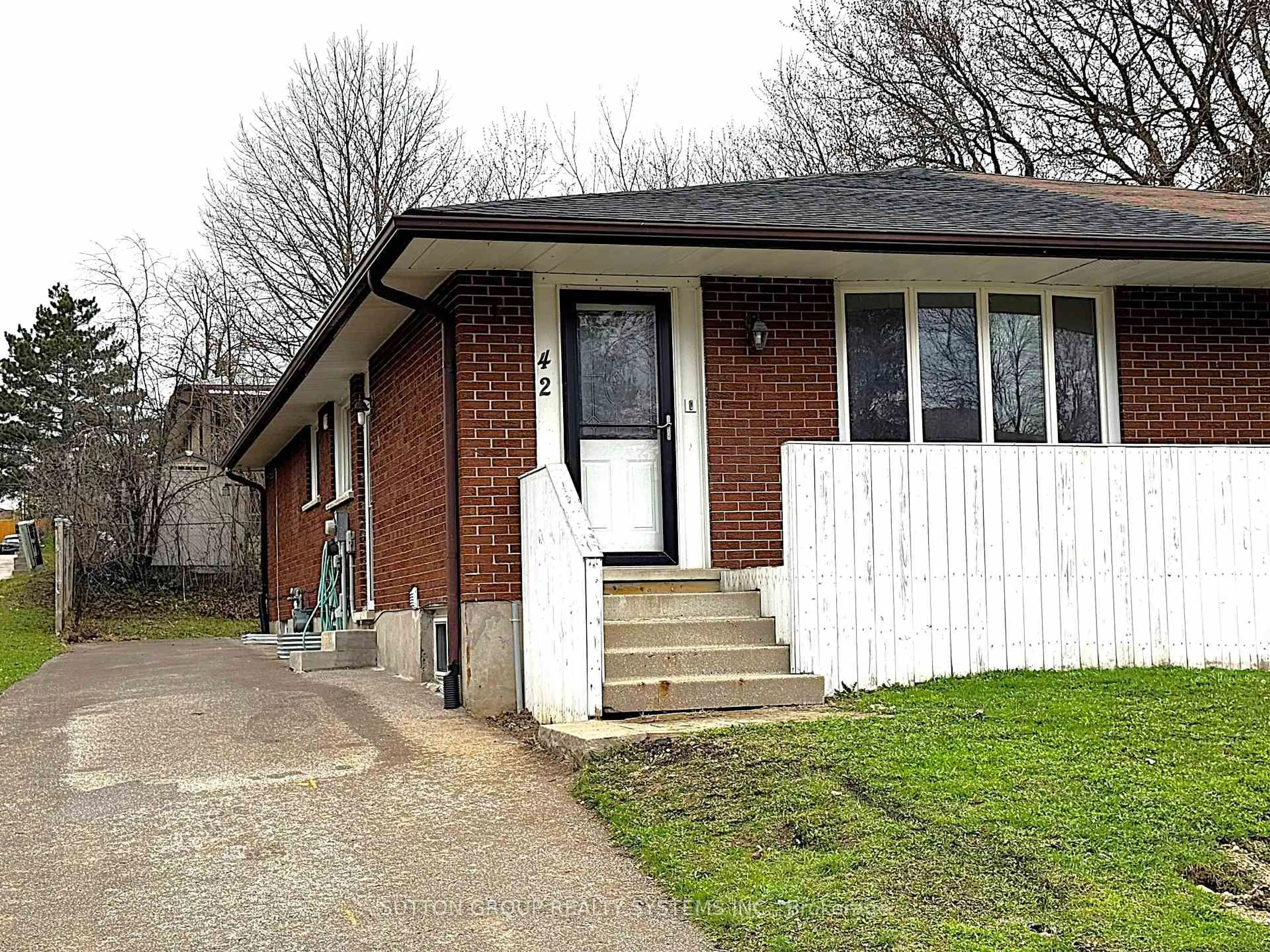 Home with brick exterior material, street for 42 Ingleside Dr, Kitchener Ontario N2M 2G8