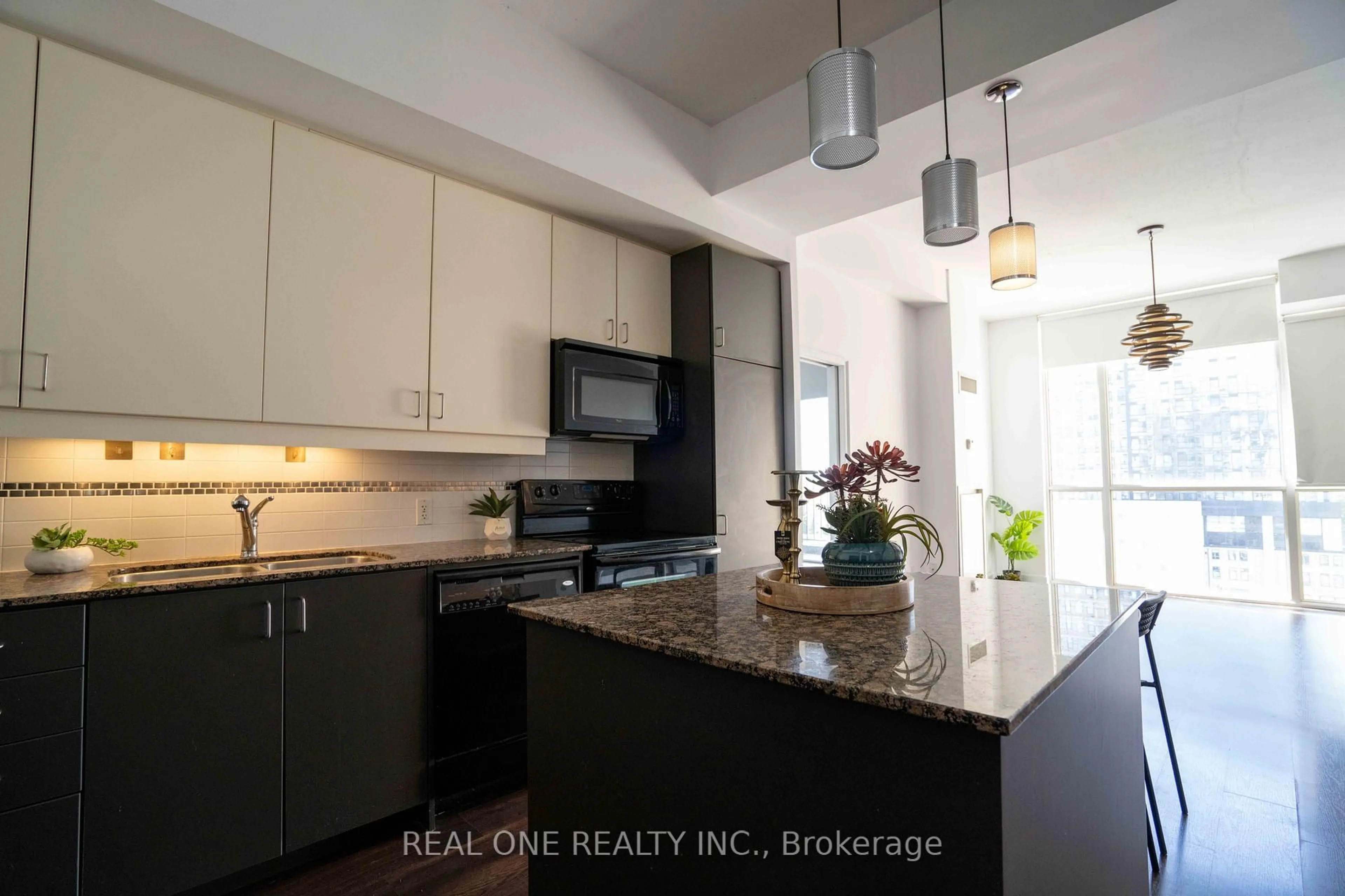 Open concept kitchen, ceramic/tile floor for 191 king St #703, Waterloo Ontario N2J 1R1