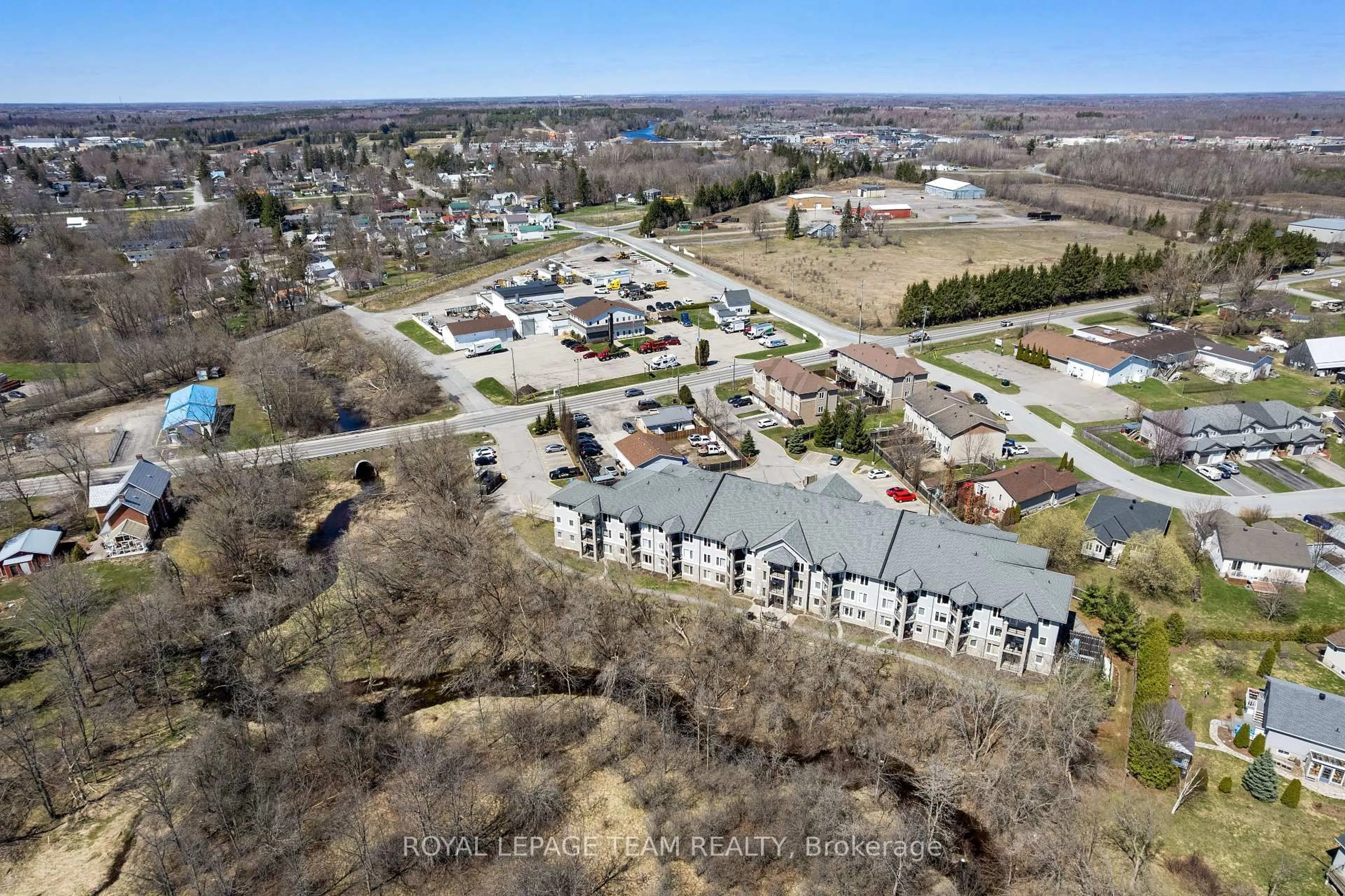 A pic from outside/outdoor area/front of a property/back of a property/a pic from drone, unknown for 398 Van Buren St #209, North Grenville Ontario K0G 1J0