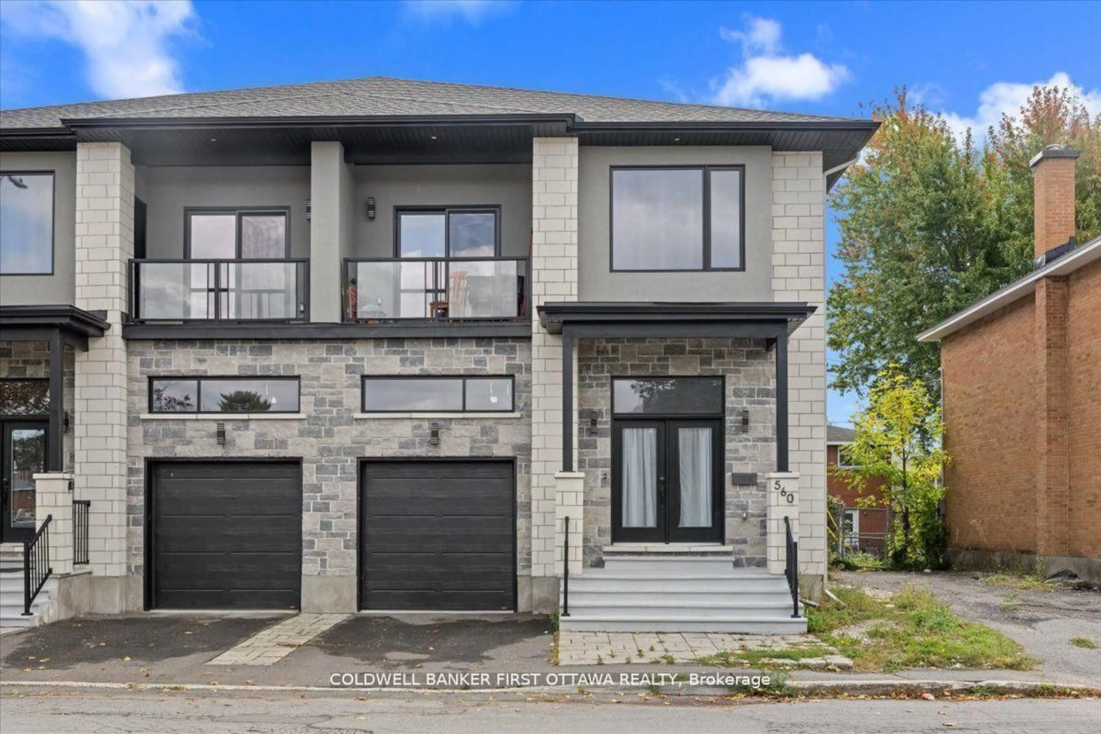 Home with brick exterior material, street for 560 QUEEN MARY St, Ottawa Ontario K1K 1W1