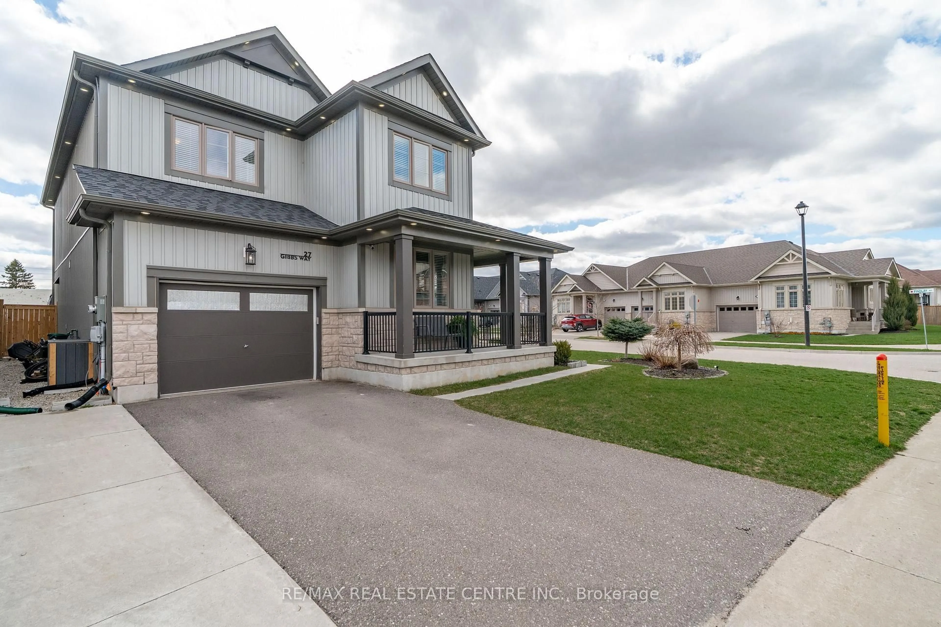 Home with vinyl exterior material, street for 27 Gibbs Way, Centre Wellington Ontario N1M 0G7