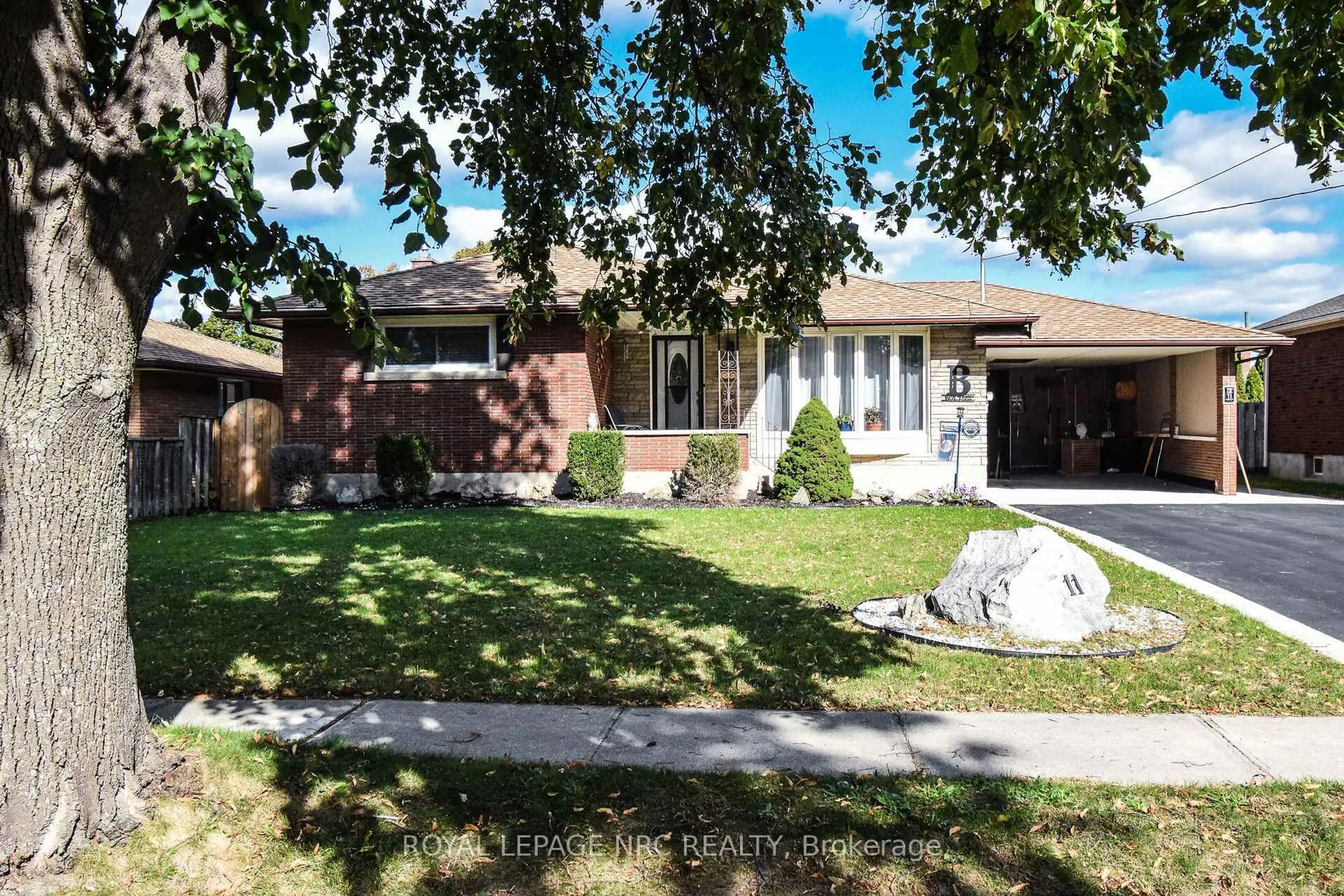 Home with brick exterior material, street for 11 Grosvenor St, St. Catharines Ontario L2M 3E9