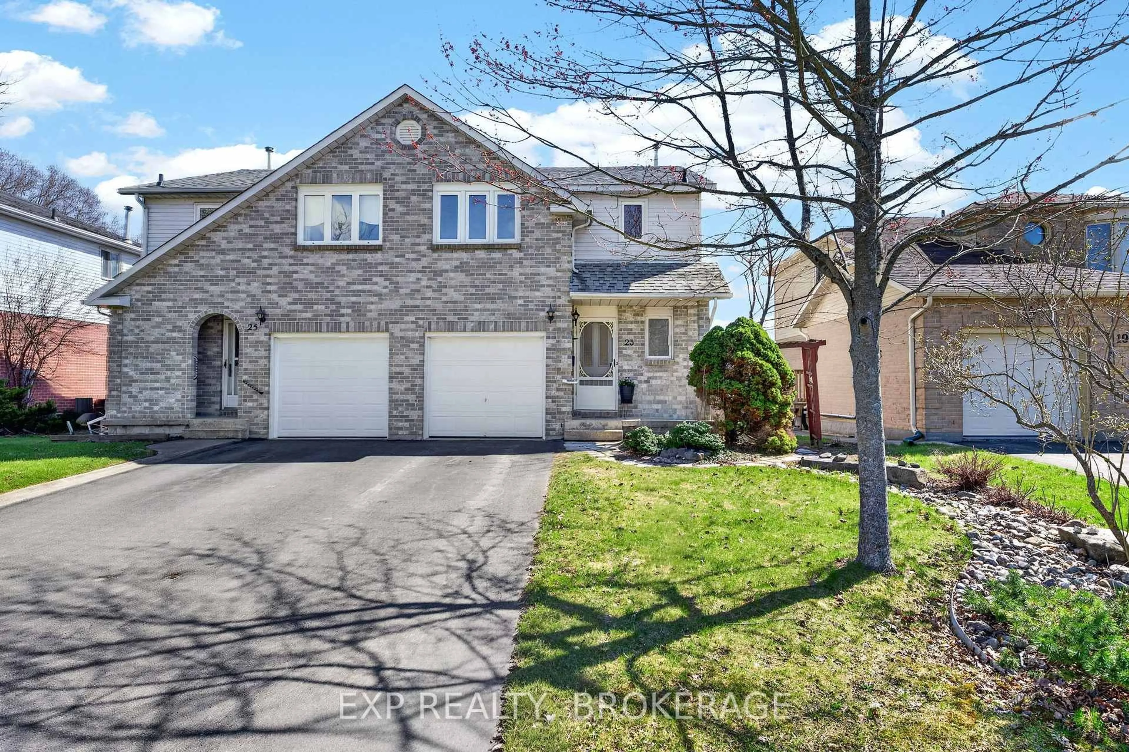 Home with brick exterior material, street for 23 Rose Abbey Dr, Kingston Ontario K7M 6W1
