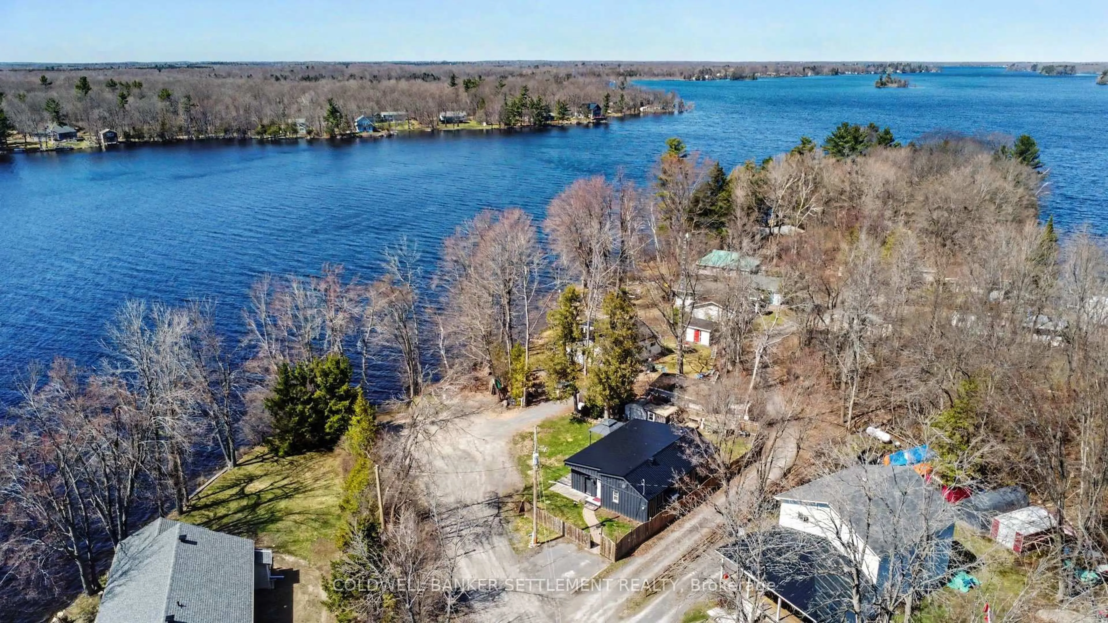 A pic from outside/outdoor area/front of a property/back of a property/a pic from drone, water/lake/river/ocean view for 128 Loon Lane, Beckwith Ontario K7C 4L8