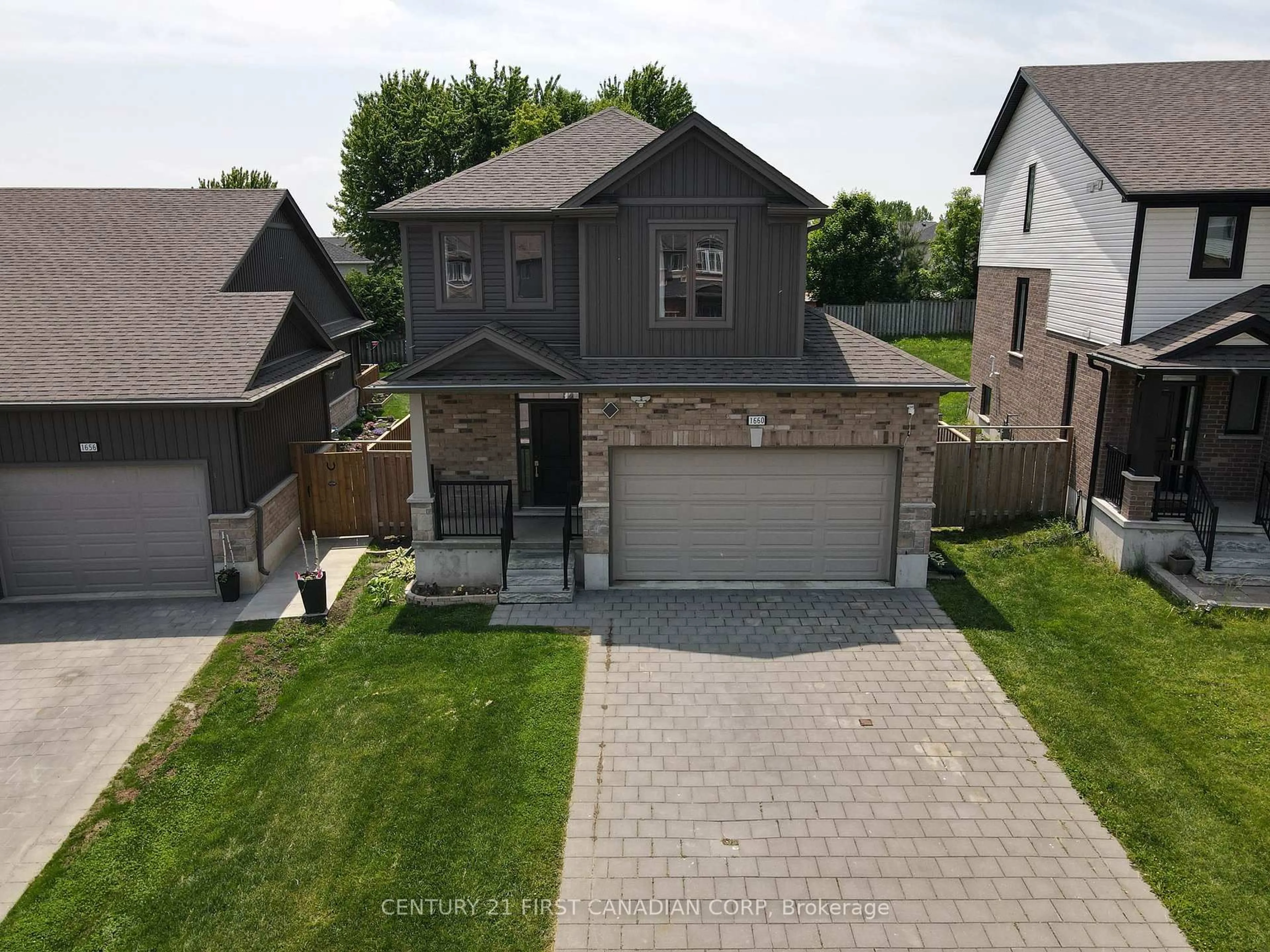 A pic from outside/outdoor area/front of a property/back of a property/a pic from drone, street for 1660 Beaverbrook Ave, London North Ontario N6H 0E3