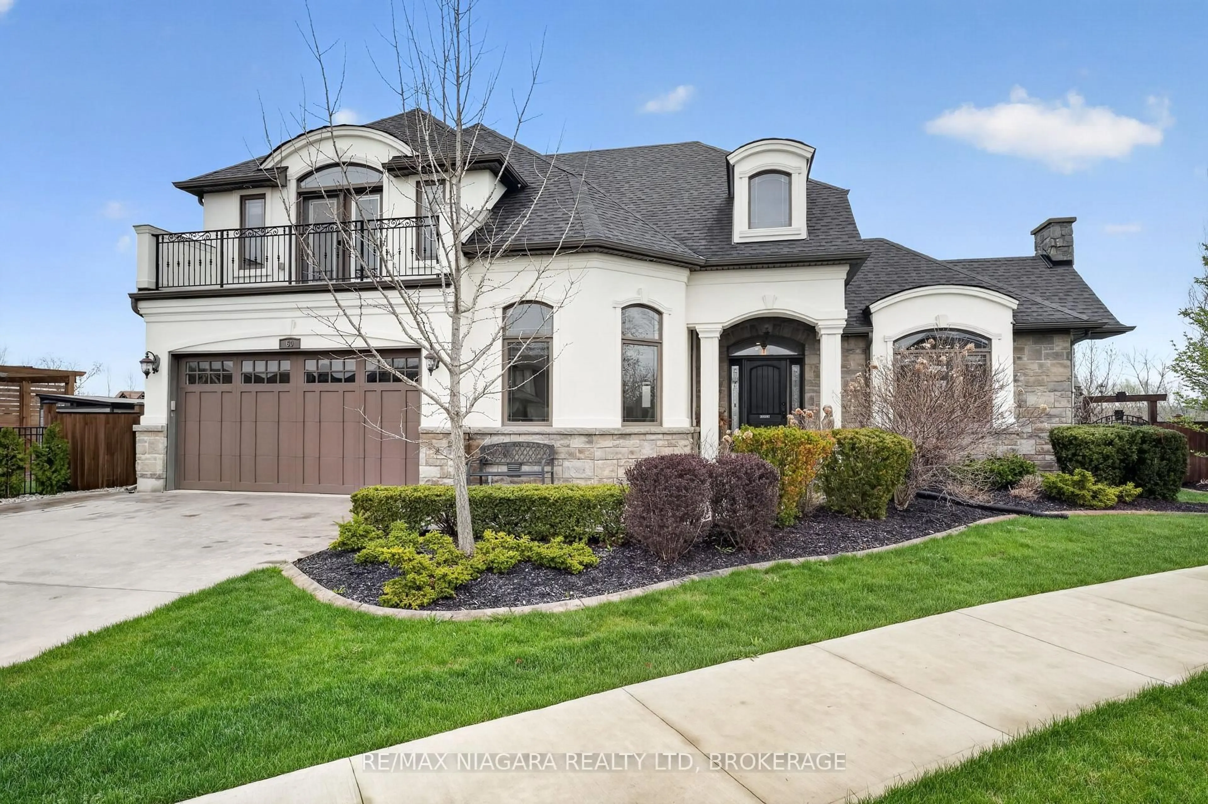 Home with brick exterior material, street for 60 Mackenzie King Ave, St. Catharines Ontario L2P 0E1