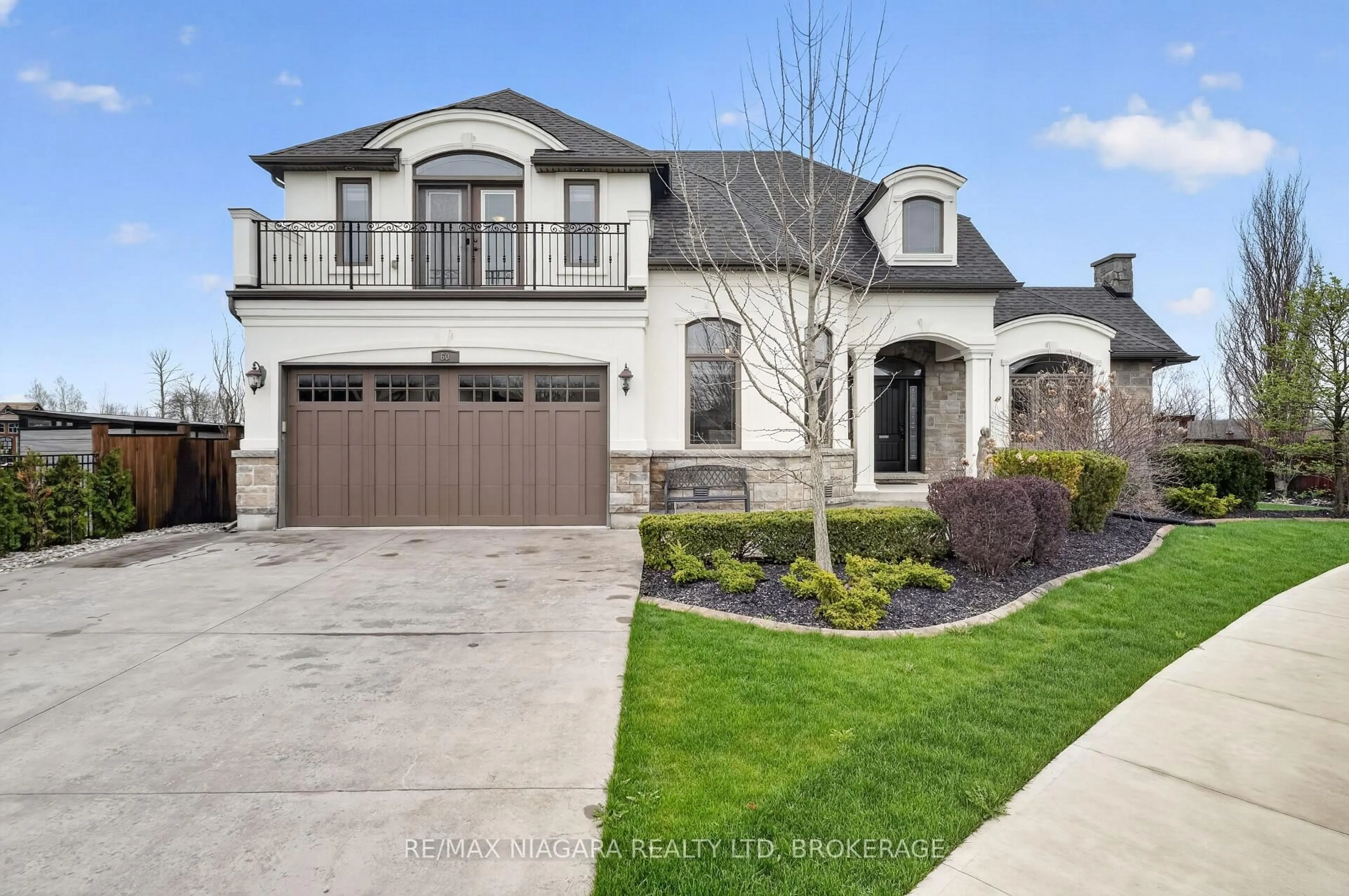 Home with brick exterior material, street for 60 Mackenzie King Ave, St. Catharines Ontario L2P 0E1