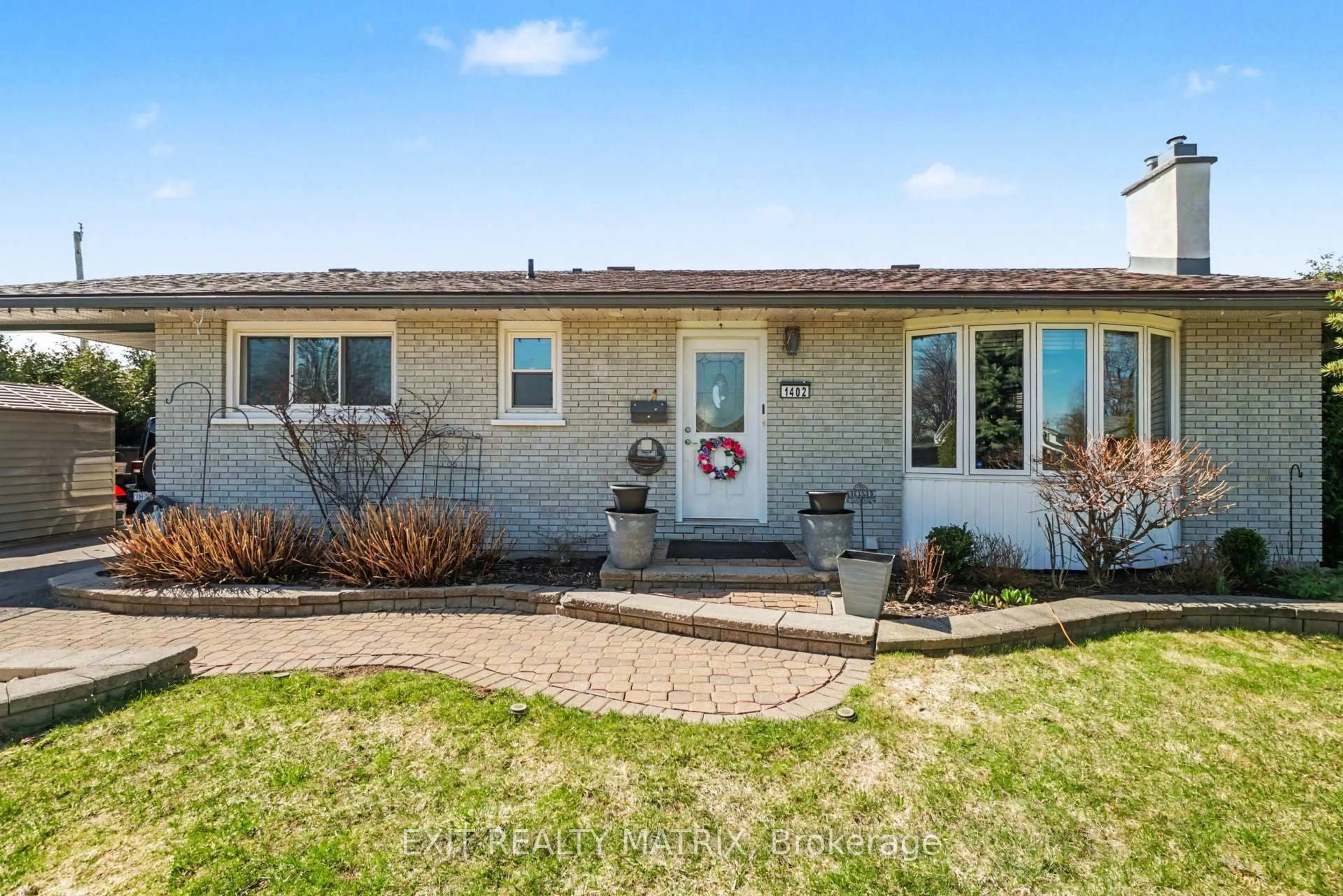 Home with brick exterior material, street for 1402 Jamison Ave, Orleans Ontario K1E 1J5