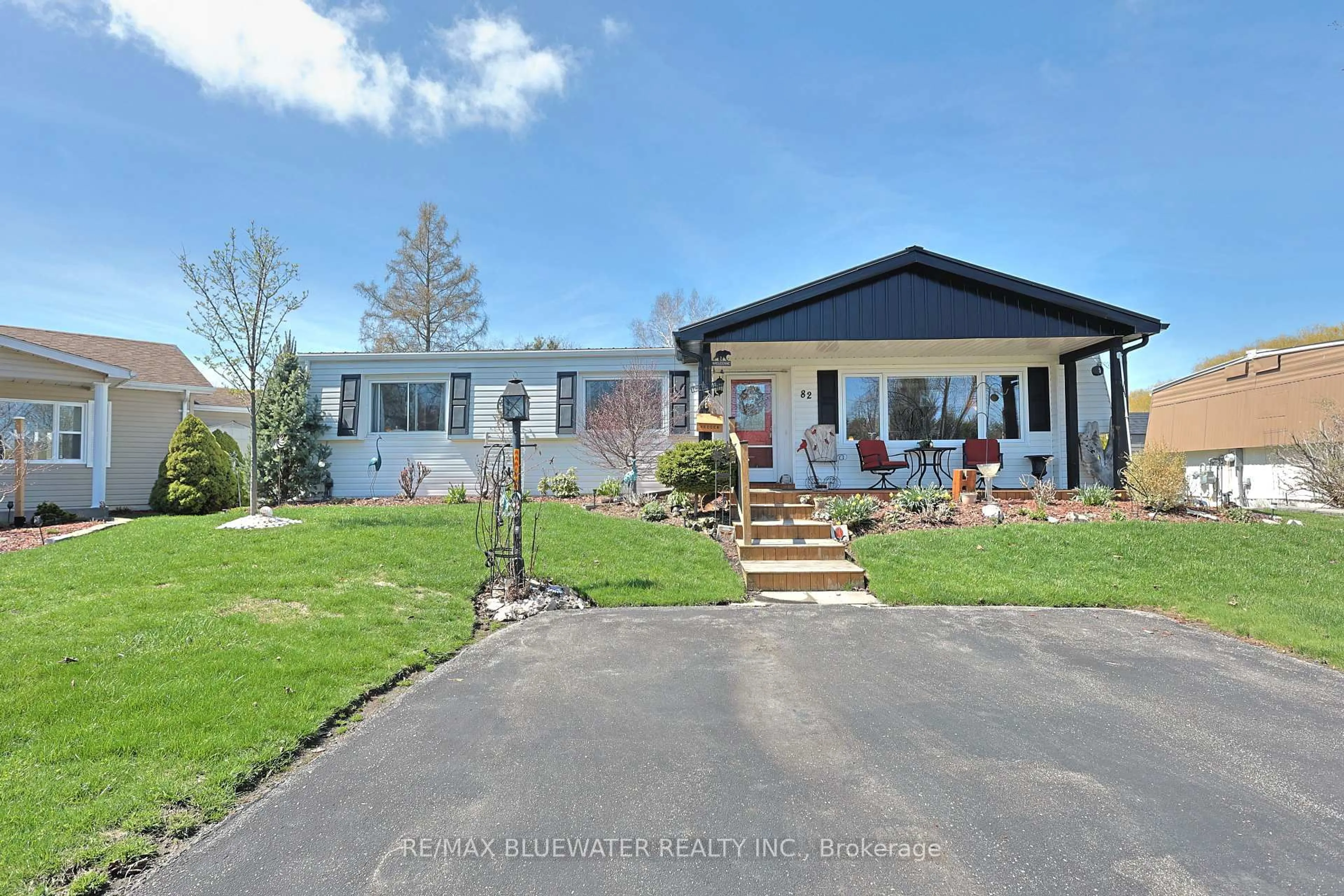 A pic from outside/outdoor area/front of a property/back of a property/a pic from drone, street for 82 Dunes Dr, South Huron Ontario N0M 1T0