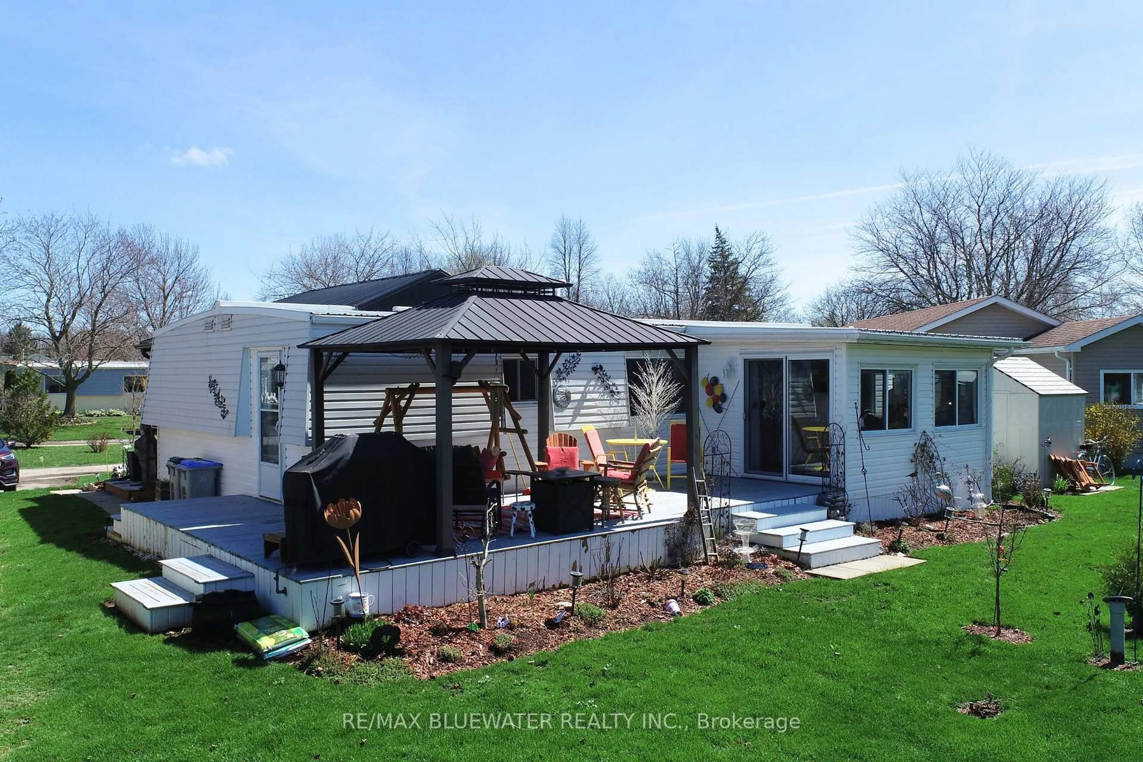 A pic from outside/outdoor area/front of a property/back of a property/a pic from drone, unknown for 82 Dunes Dr, South Huron Ontario N0M 1T0