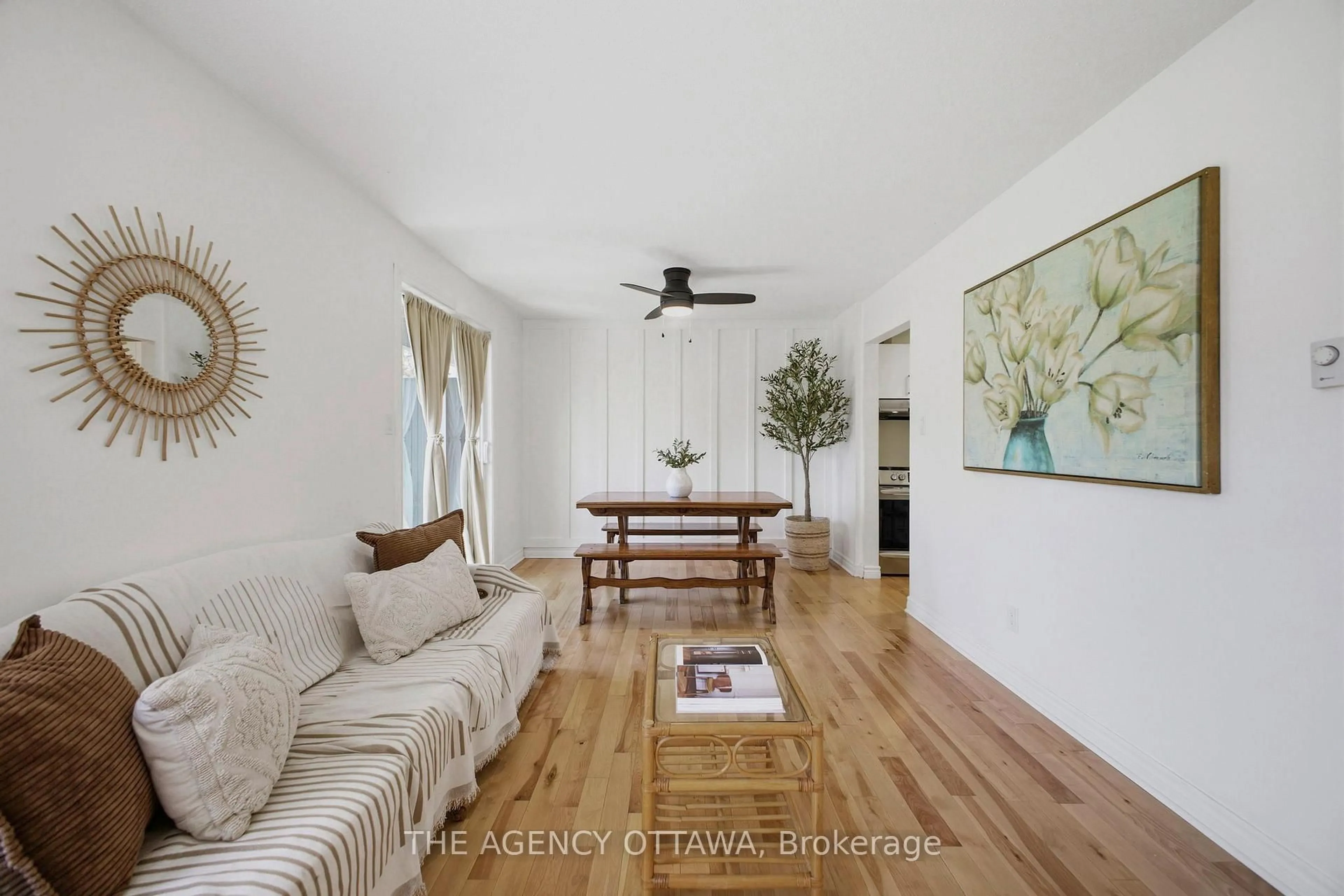 Living room with furniture, wood/laminate floor for 299 Thomas St #103, Carleton Place Ontario K7C 4B8