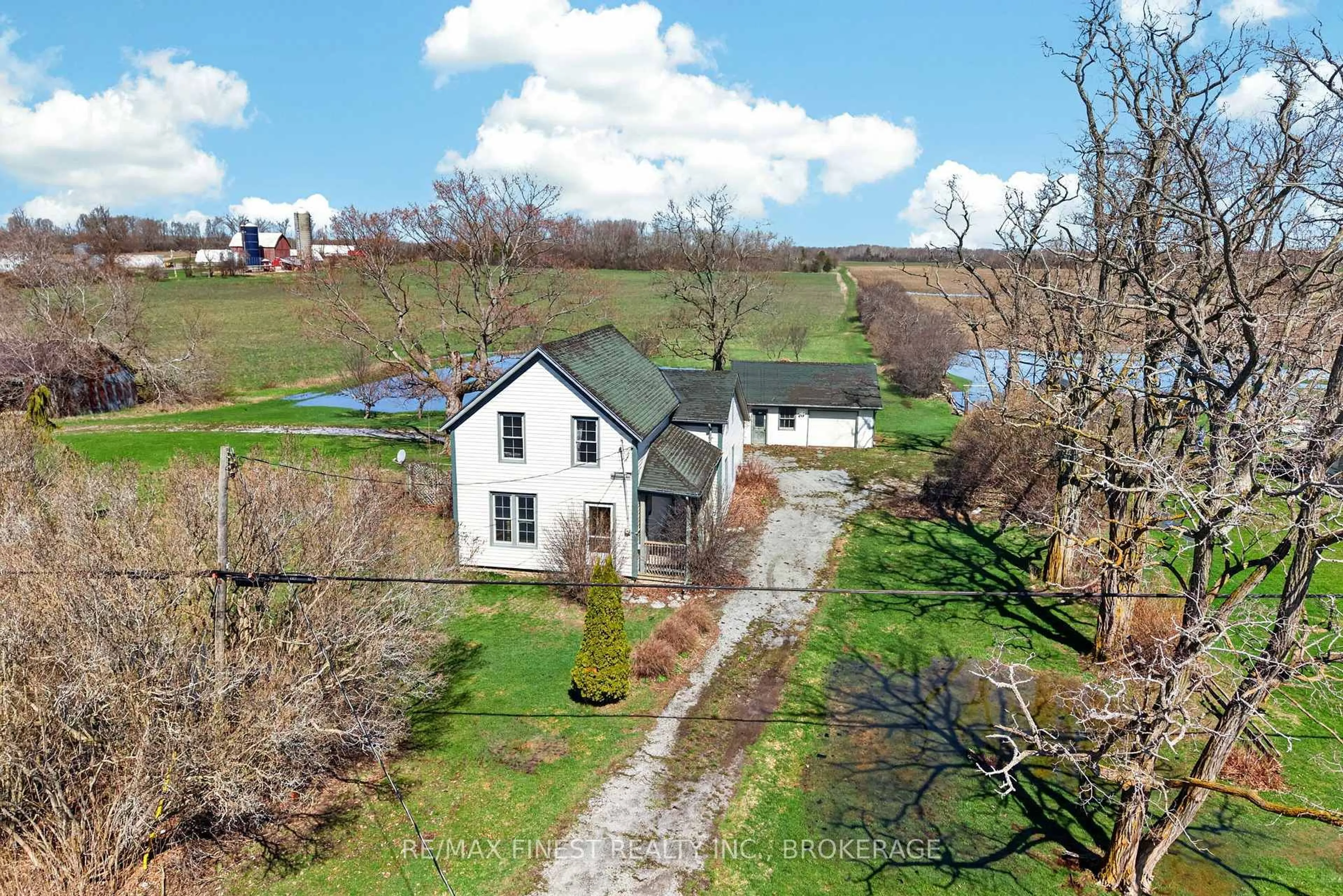 A pic from outside/outdoor area/front of a property/back of a property/a pic from drone, unknown for 17020 Loyalist Pkwy, Prince Edward County Ontario K0K 3L0