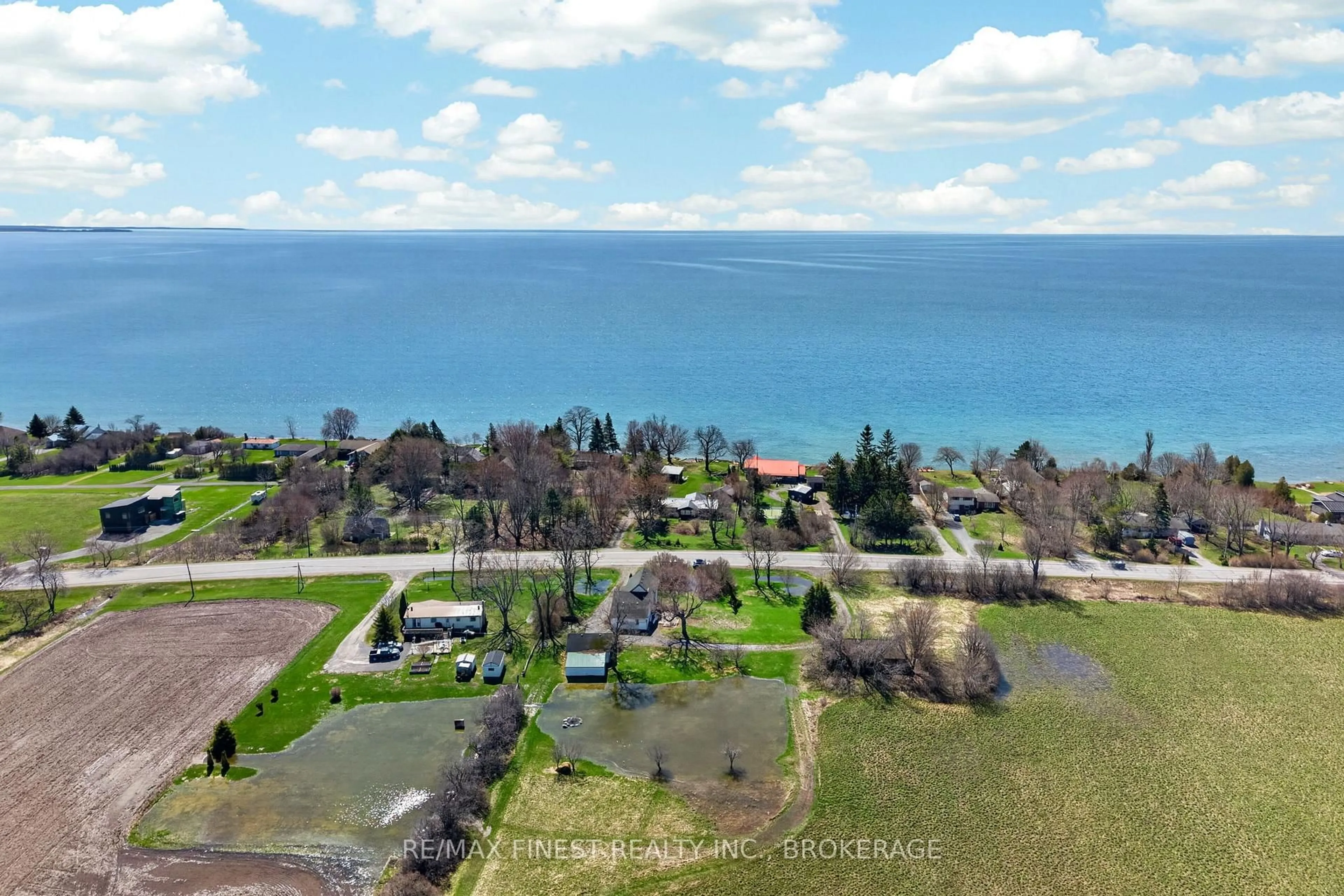 A pic from outside/outdoor area/front of a property/back of a property/a pic from drone, water/lake/river/ocean view for 17020 Loyalist Pkwy, Prince Edward County Ontario K0K 3L0