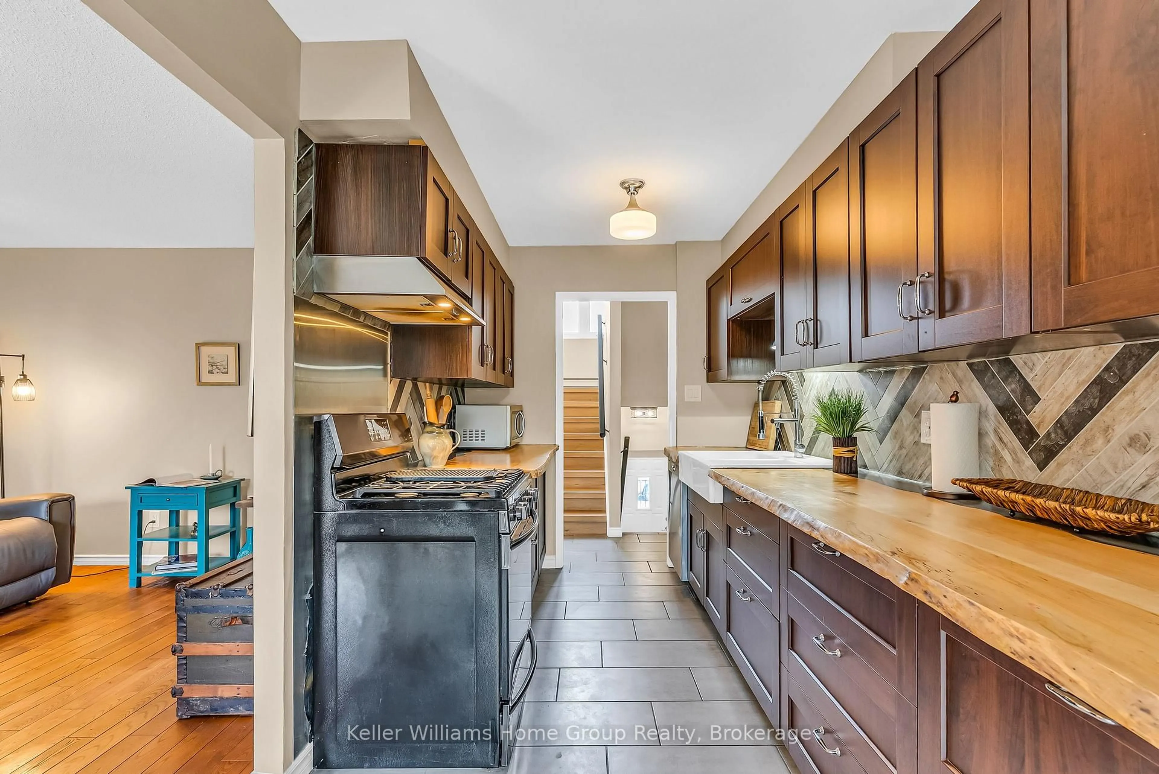 Open concept kitchen, ceramic/tile floor for 49 Rhonda Rd #119, Guelph Ontario N1H 7A4
