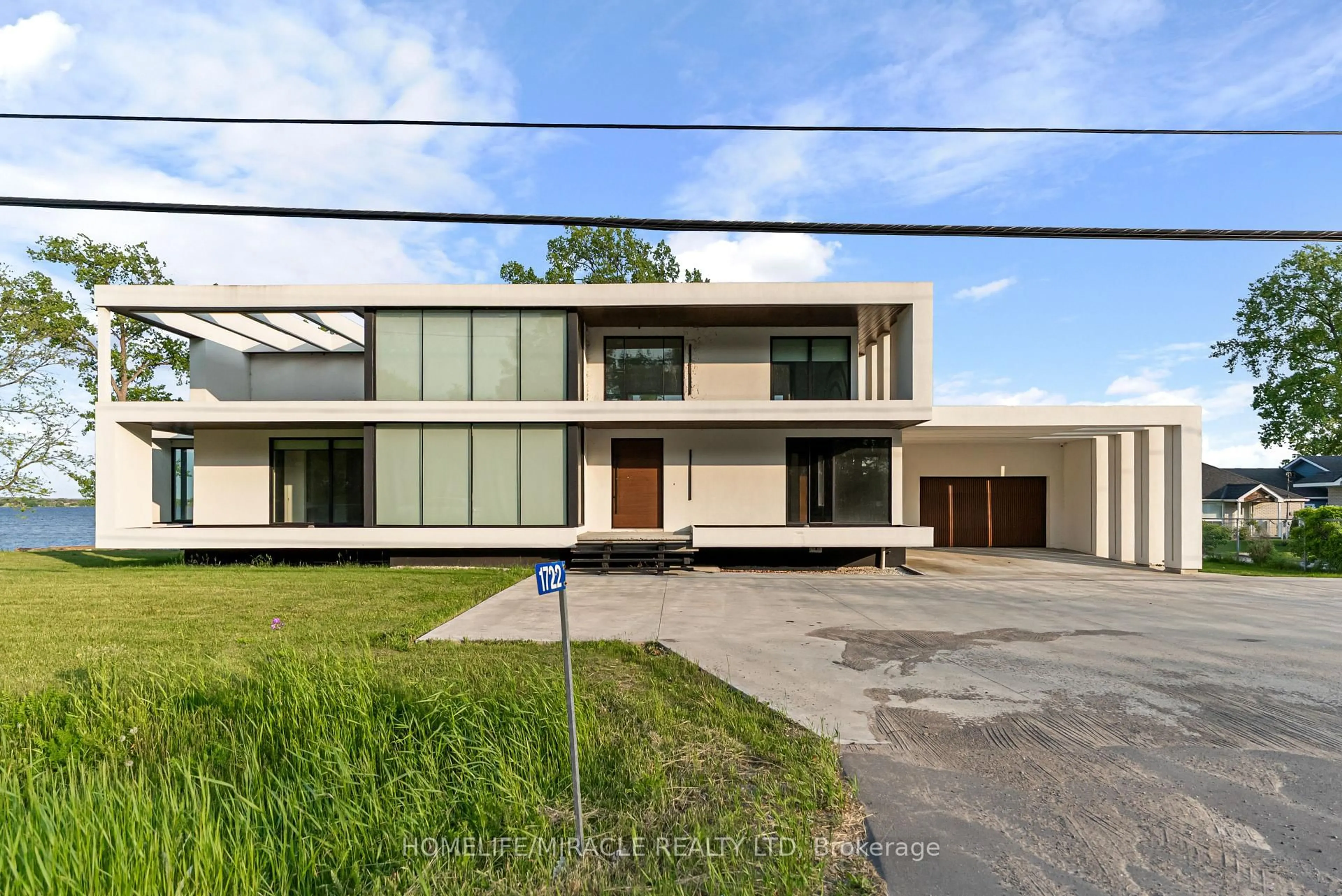 Home with vinyl exterior material, street for 1722 Old Highway 2, Belleville Ontario K8N 4Z2