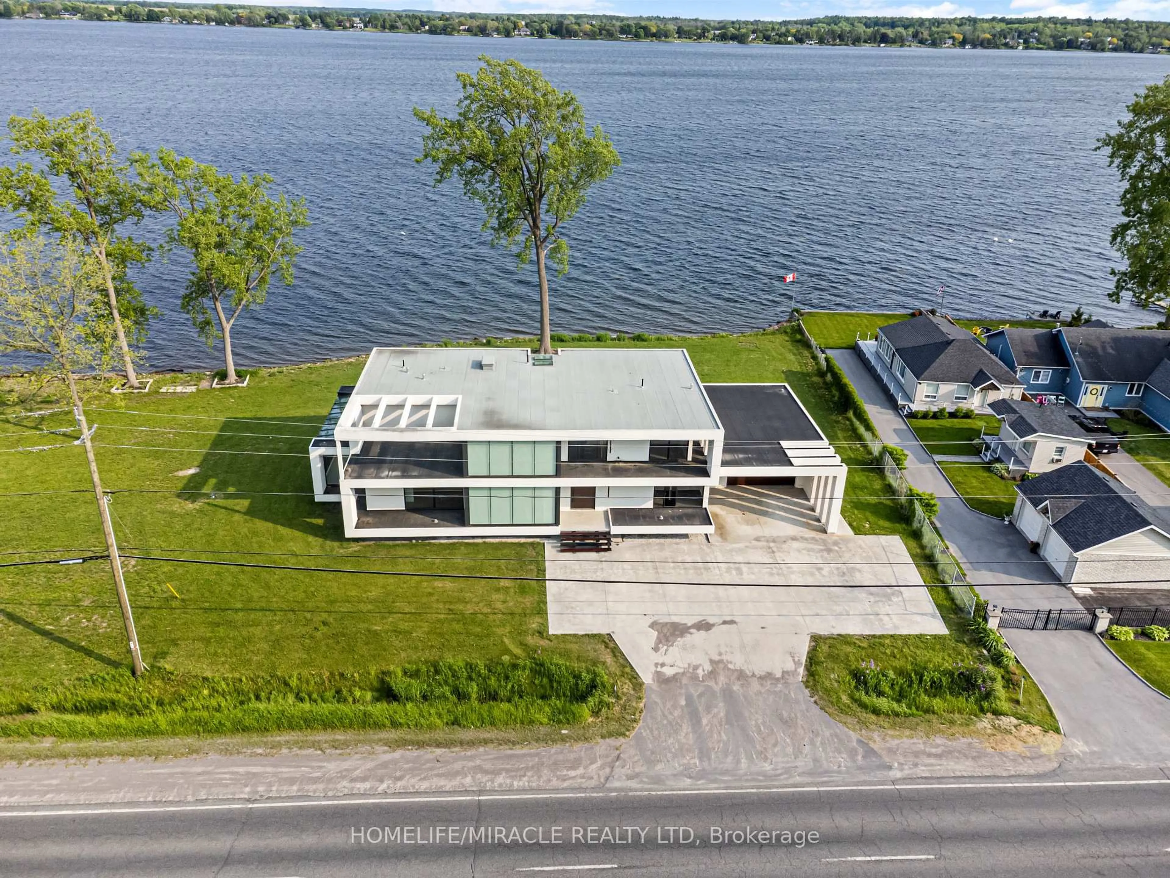 A pic from outside/outdoor area/front of a property/back of a property/a pic from drone, water/lake/river/ocean view for 1722 Old Highway 2, Belleville Ontario K8N 4Z2