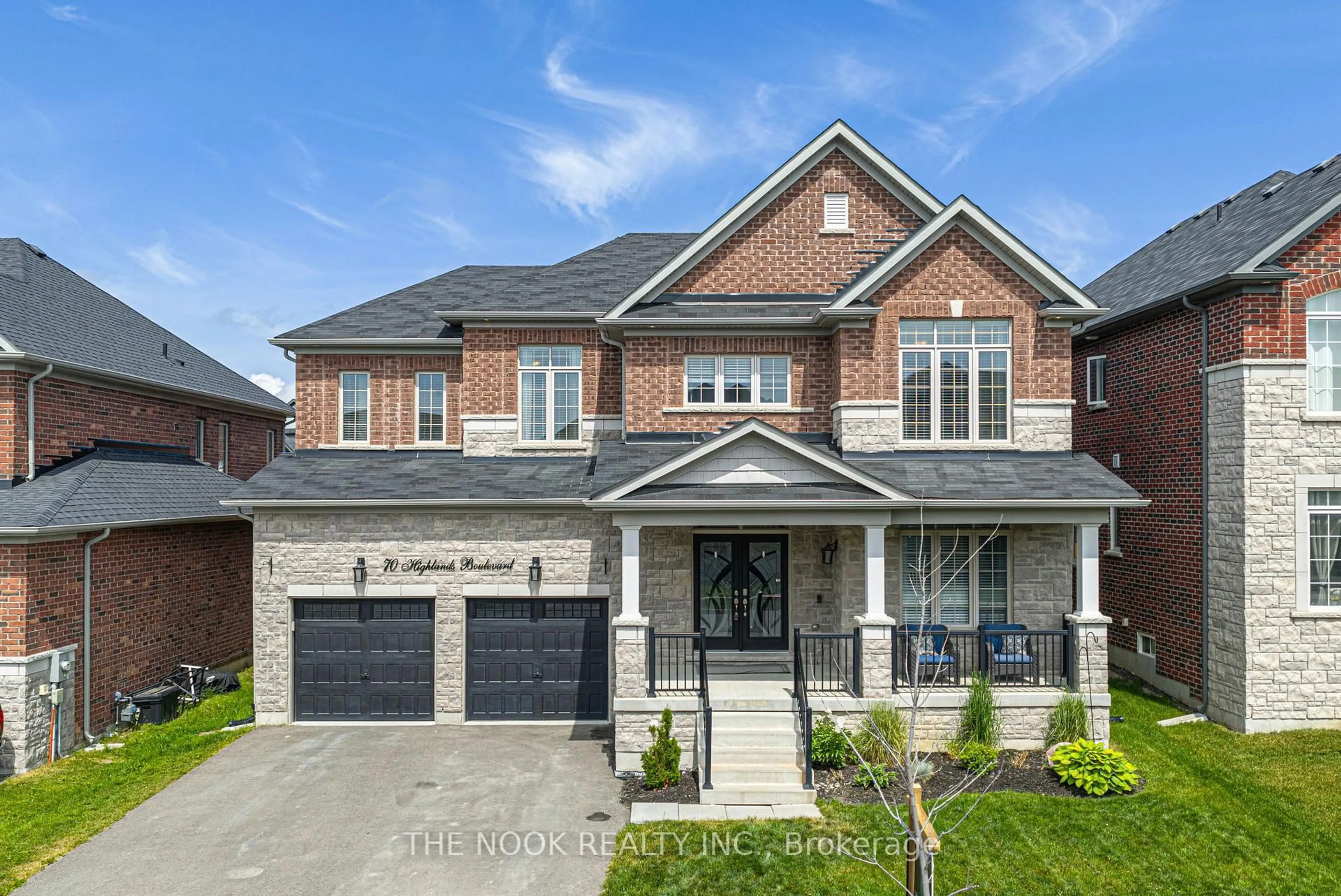 Home with brick exterior material, street for 70 Highlands Blvd, Cavan Monaghan Ontario L0A 1G0