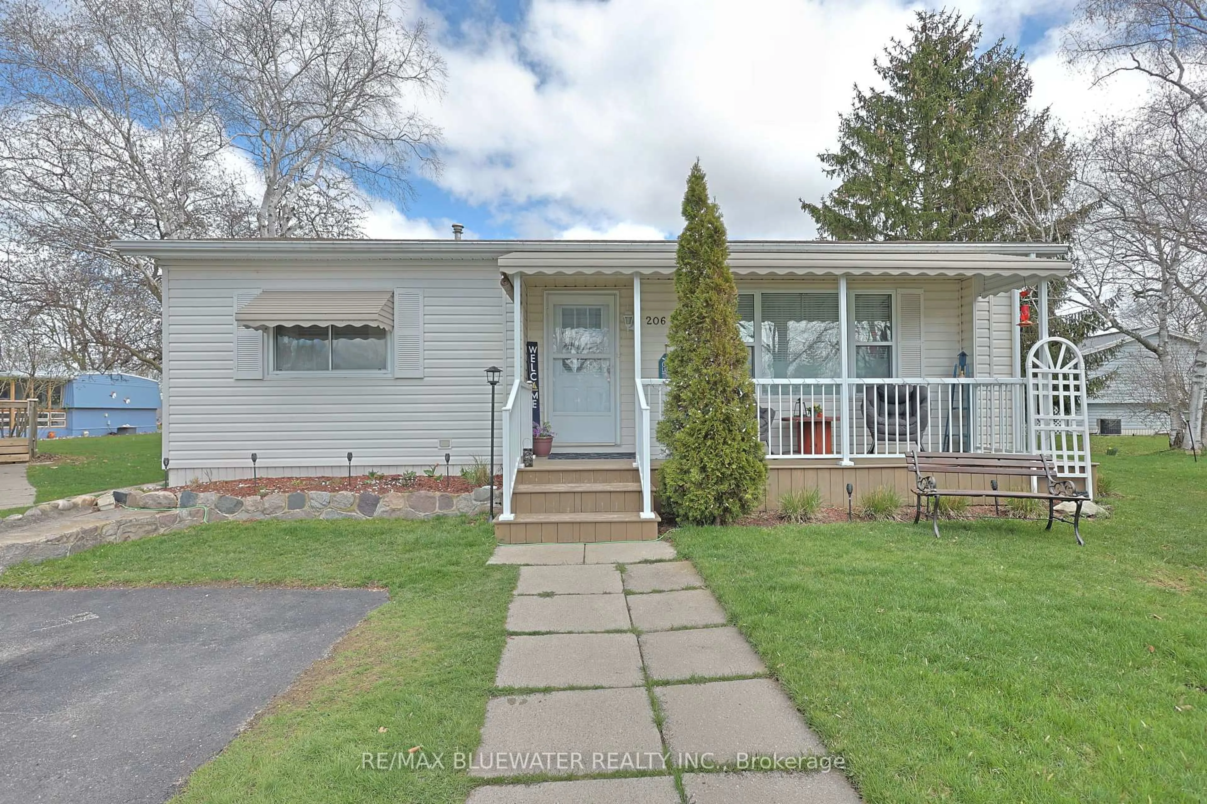 Home with vinyl exterior material, street for 206 Biltmore Dr, South Huron Ontario N0M 1T0