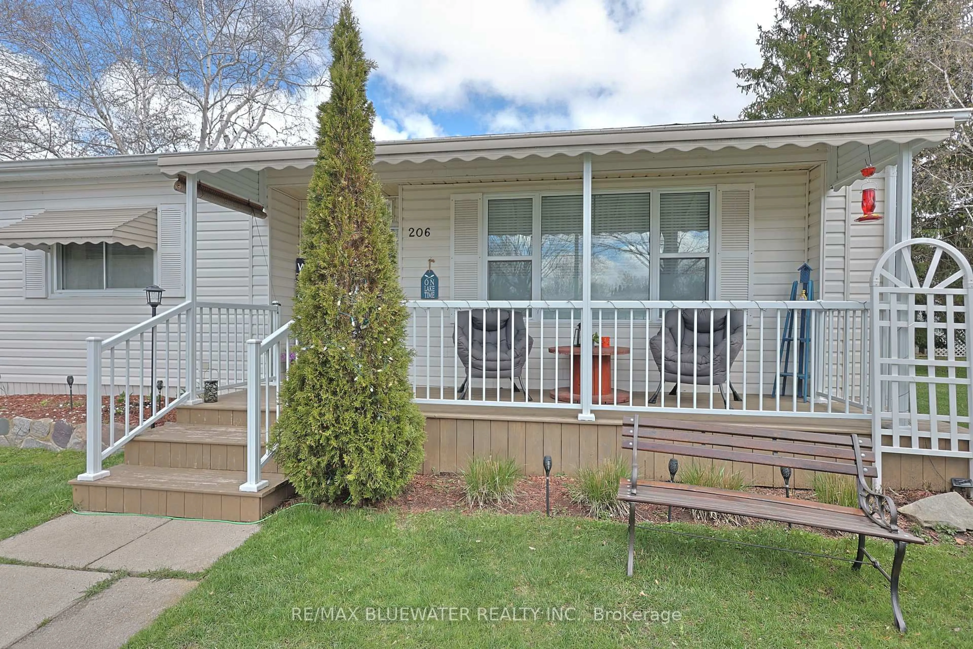 Home with vinyl exterior material, street for 206 Biltmore Dr, South Huron Ontario N0M 1T0