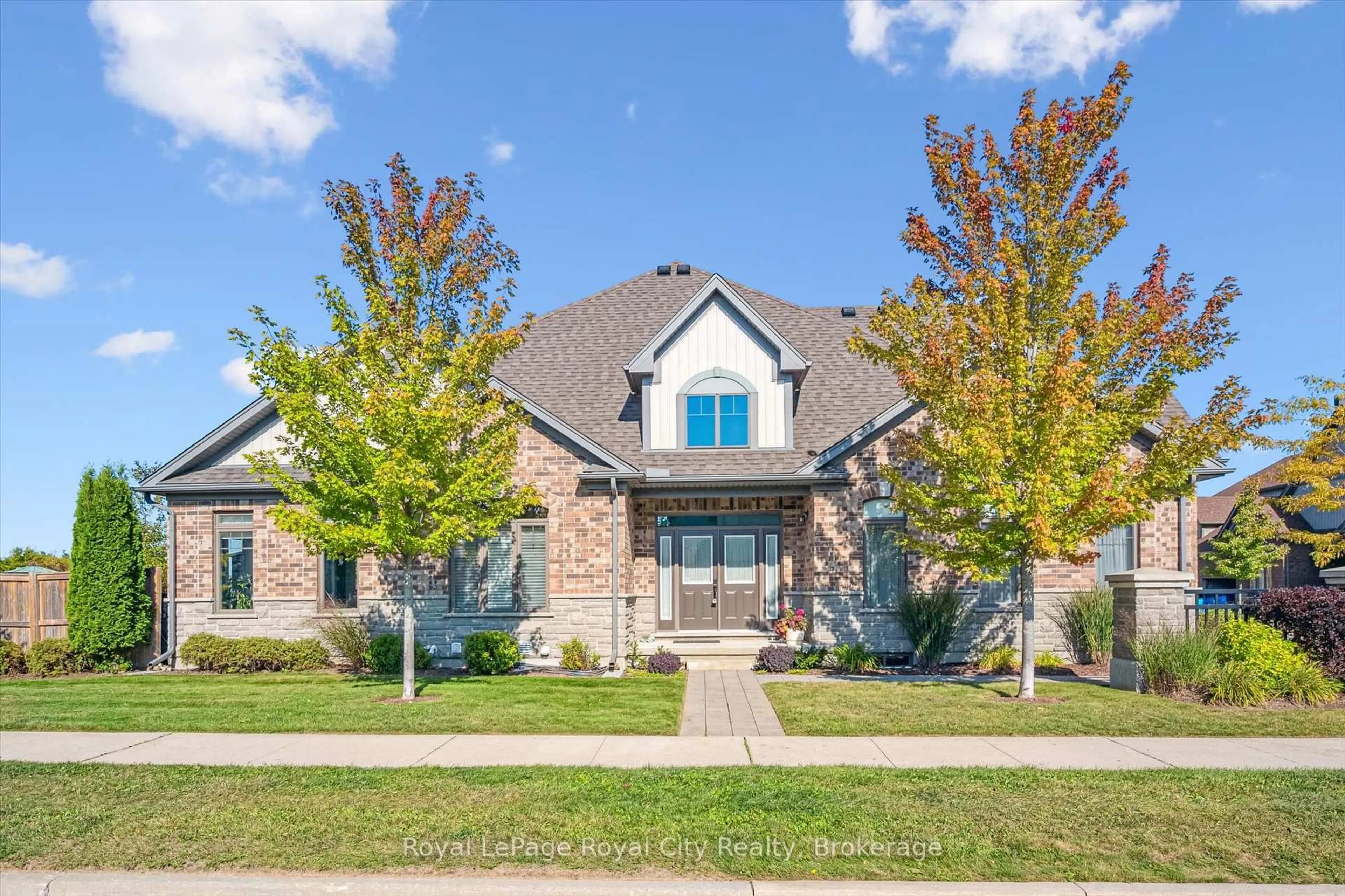 Home with brick exterior material, street for 39 Kay Cres #1, Guelph Ontario N1L 0N5