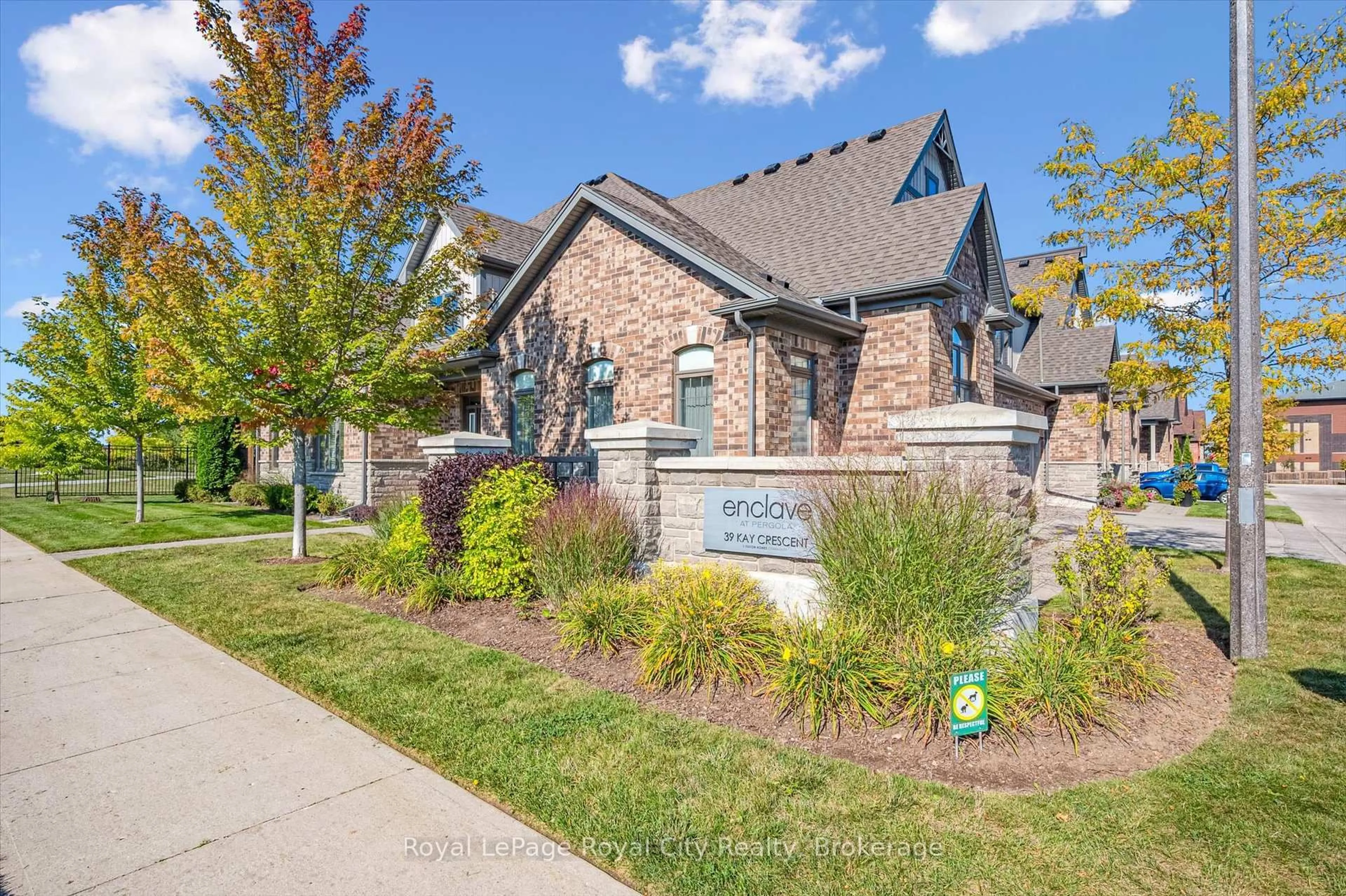 Home with brick exterior material, street for 39 Kay Cres #1, Guelph Ontario N1L 0N5