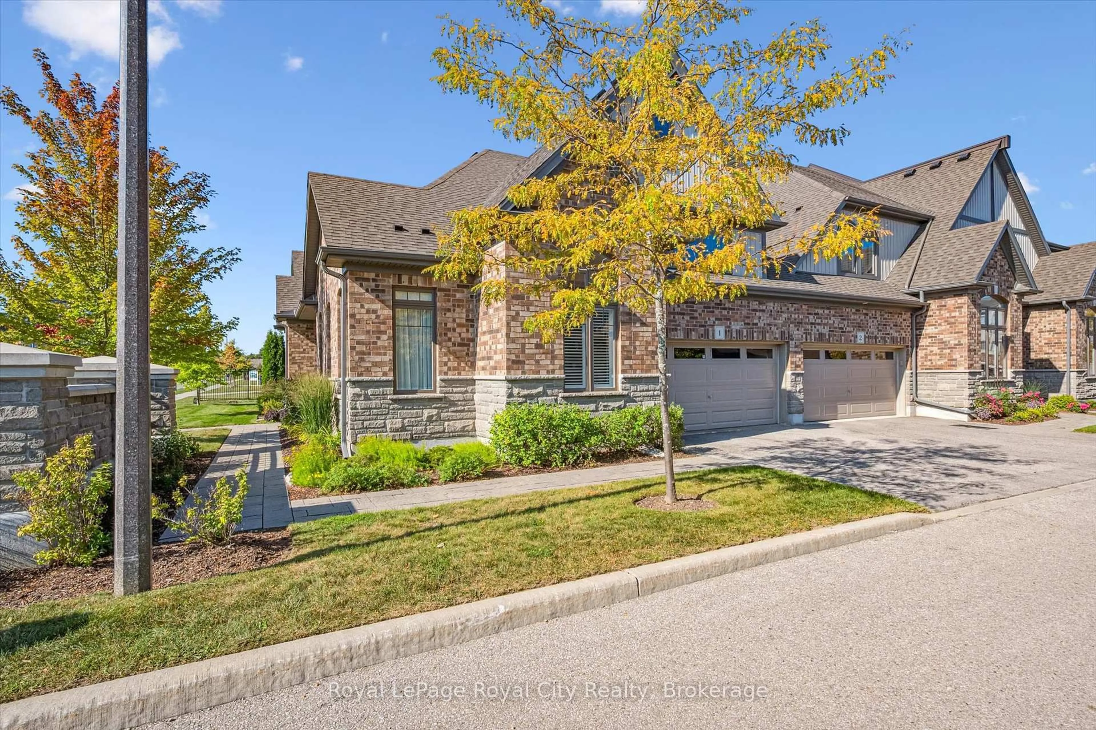 Home with brick exterior material, street for 39 Kay Cres #1, Guelph Ontario N1L 0N5