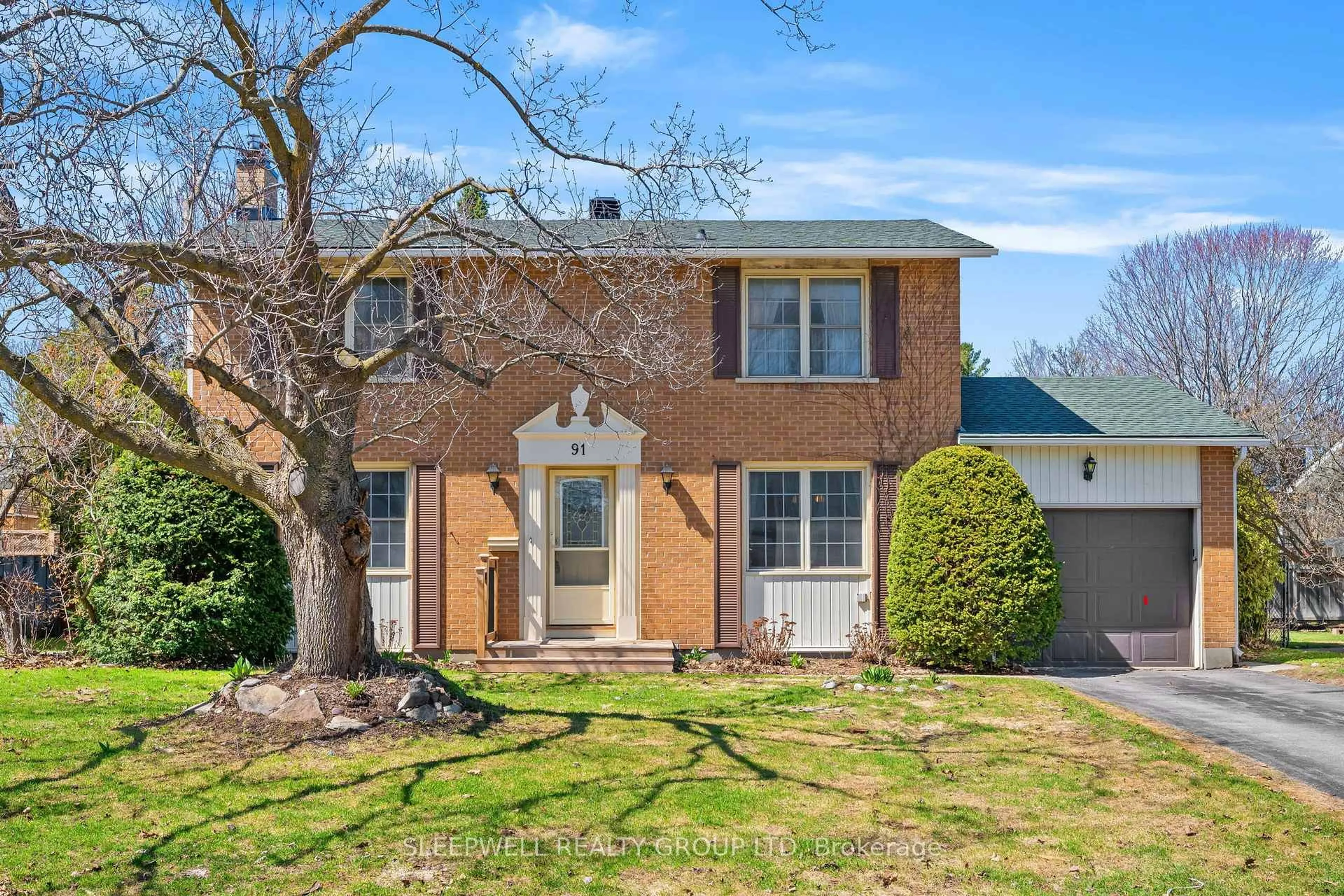 Home with brick exterior material, street for 91 Country Lane, Ottawa Ontario K2L 1J4