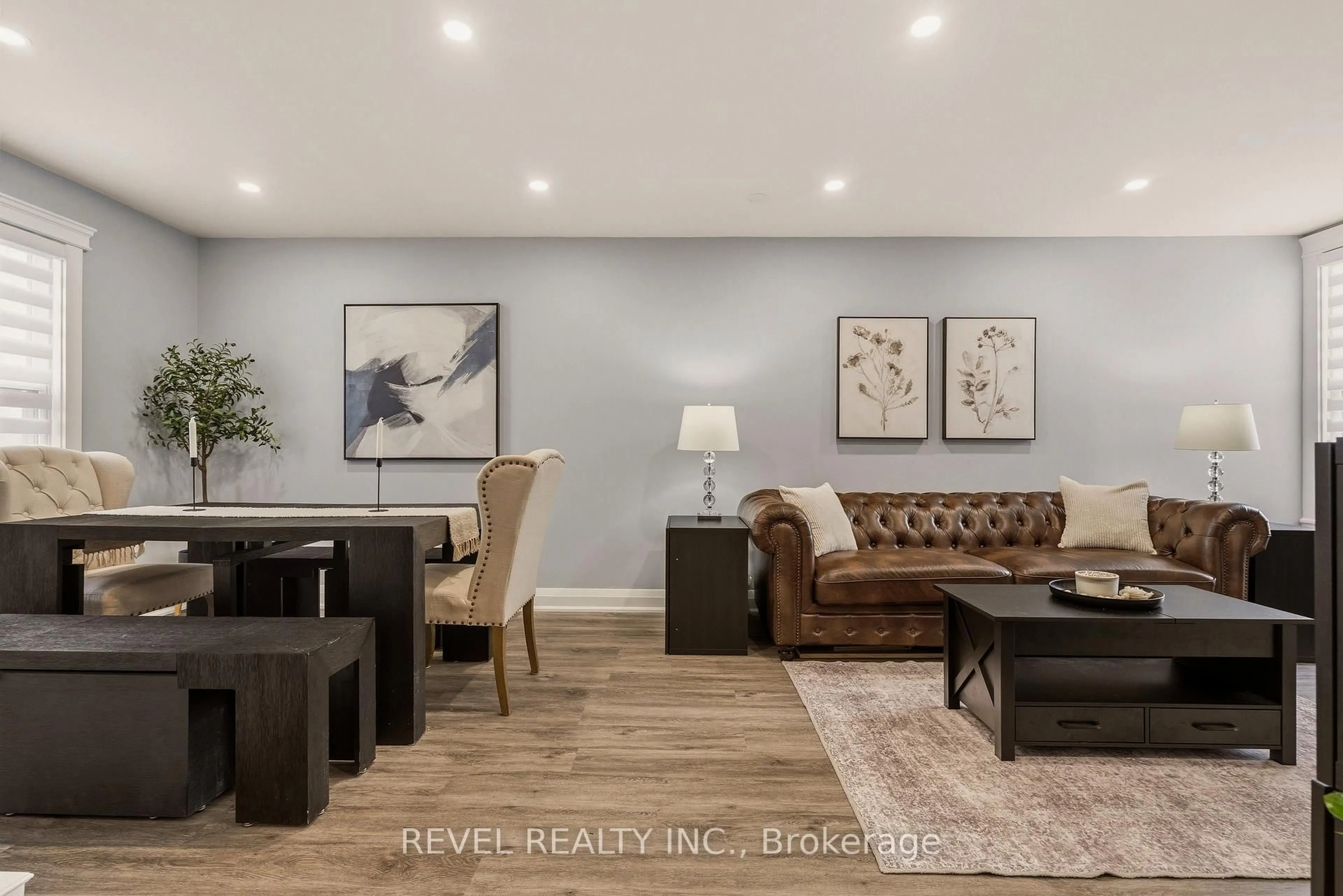 Living room with furniture, wood/laminate floor for 14 Mars Ave, Hamilton Ontario L8L 3V8