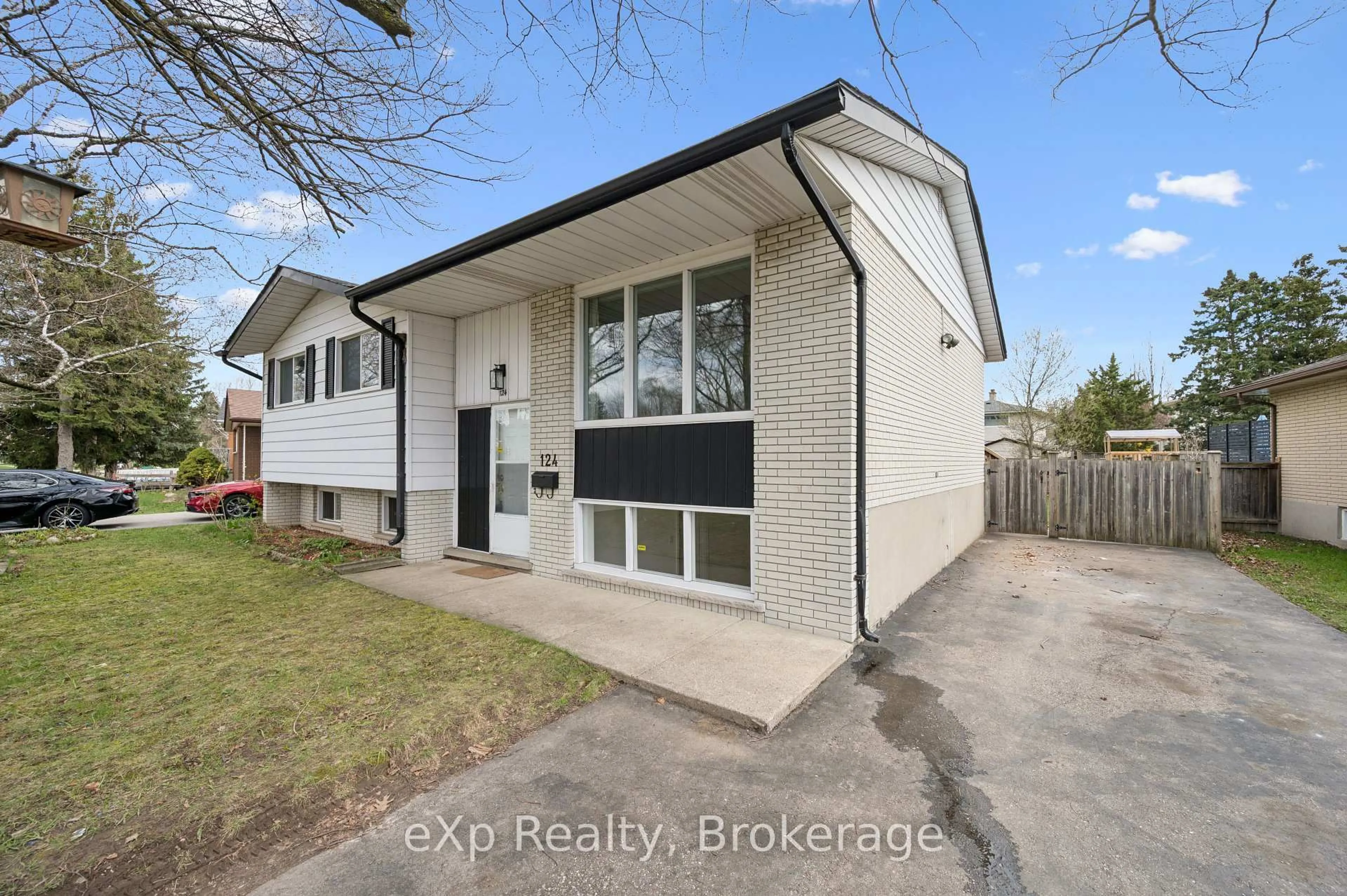 Home with brick exterior material, street for 124 Montcalm Dr, Kitchener Ontario N2B 2R5