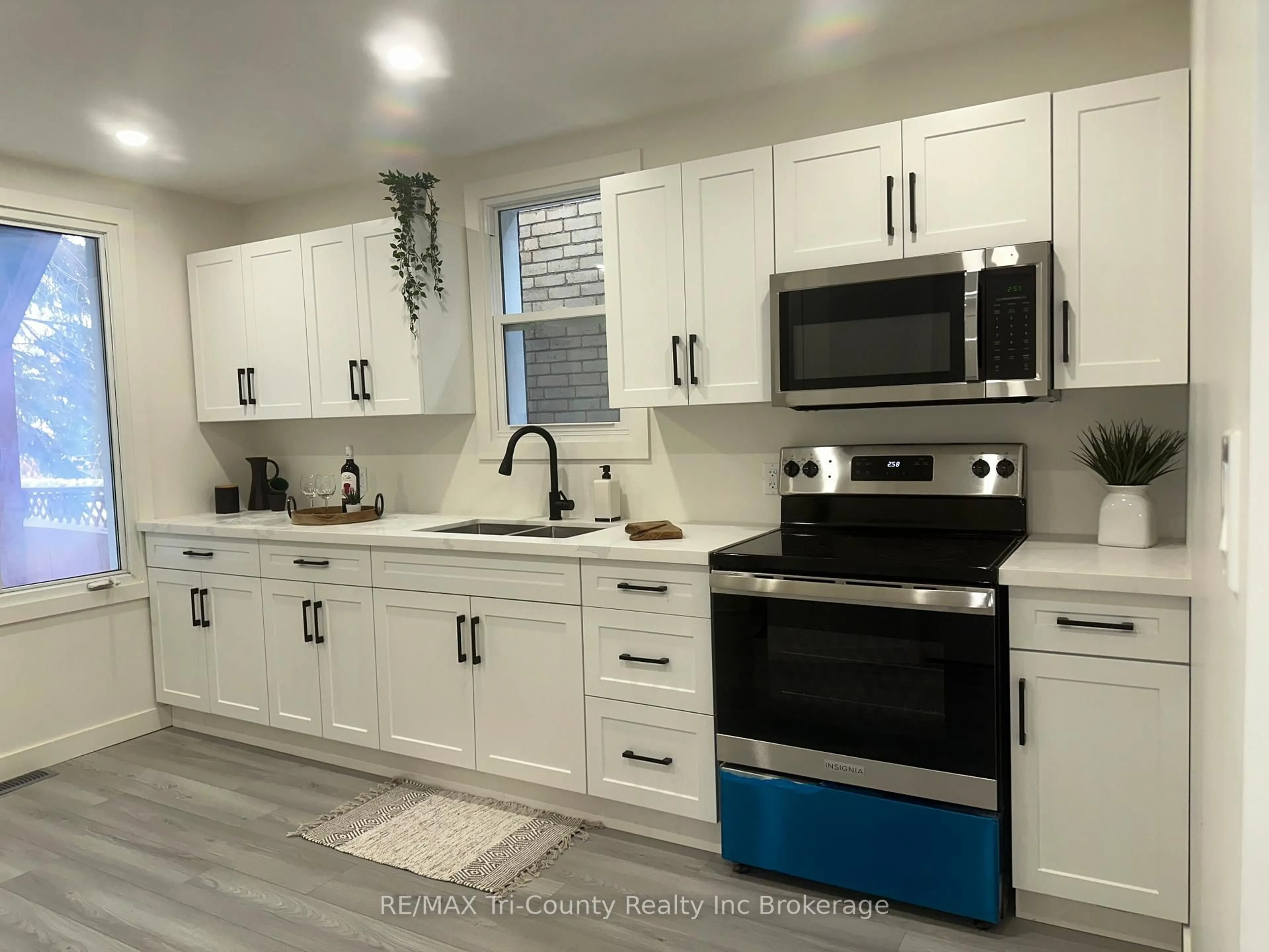 Open concept kitchen, ceramic/tile floor for 719 Elias St, London East Ontario N5W 3N8