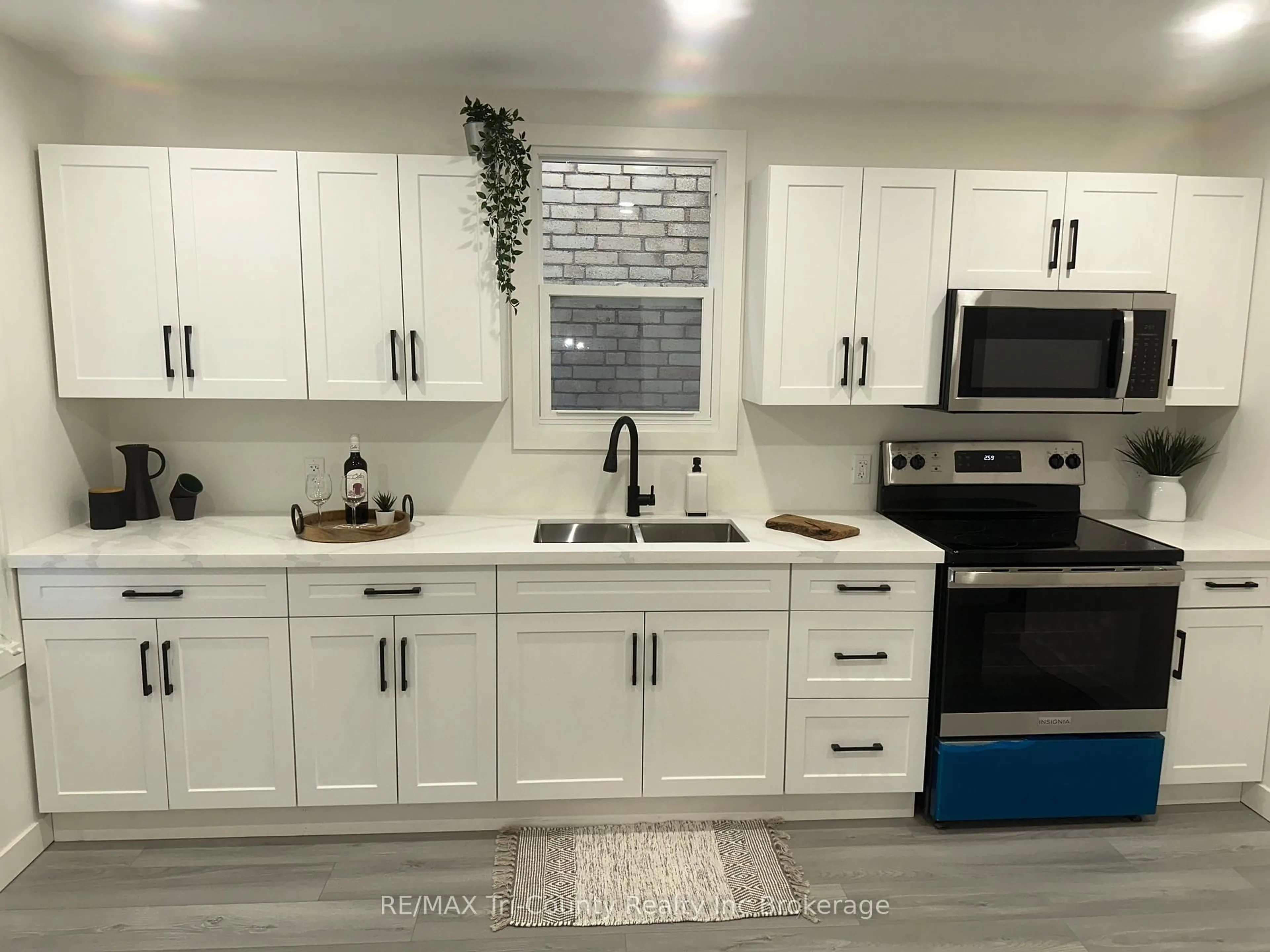 Open concept kitchen, ceramic/tile floor for 719 Elias St, London East Ontario N5W 3N8