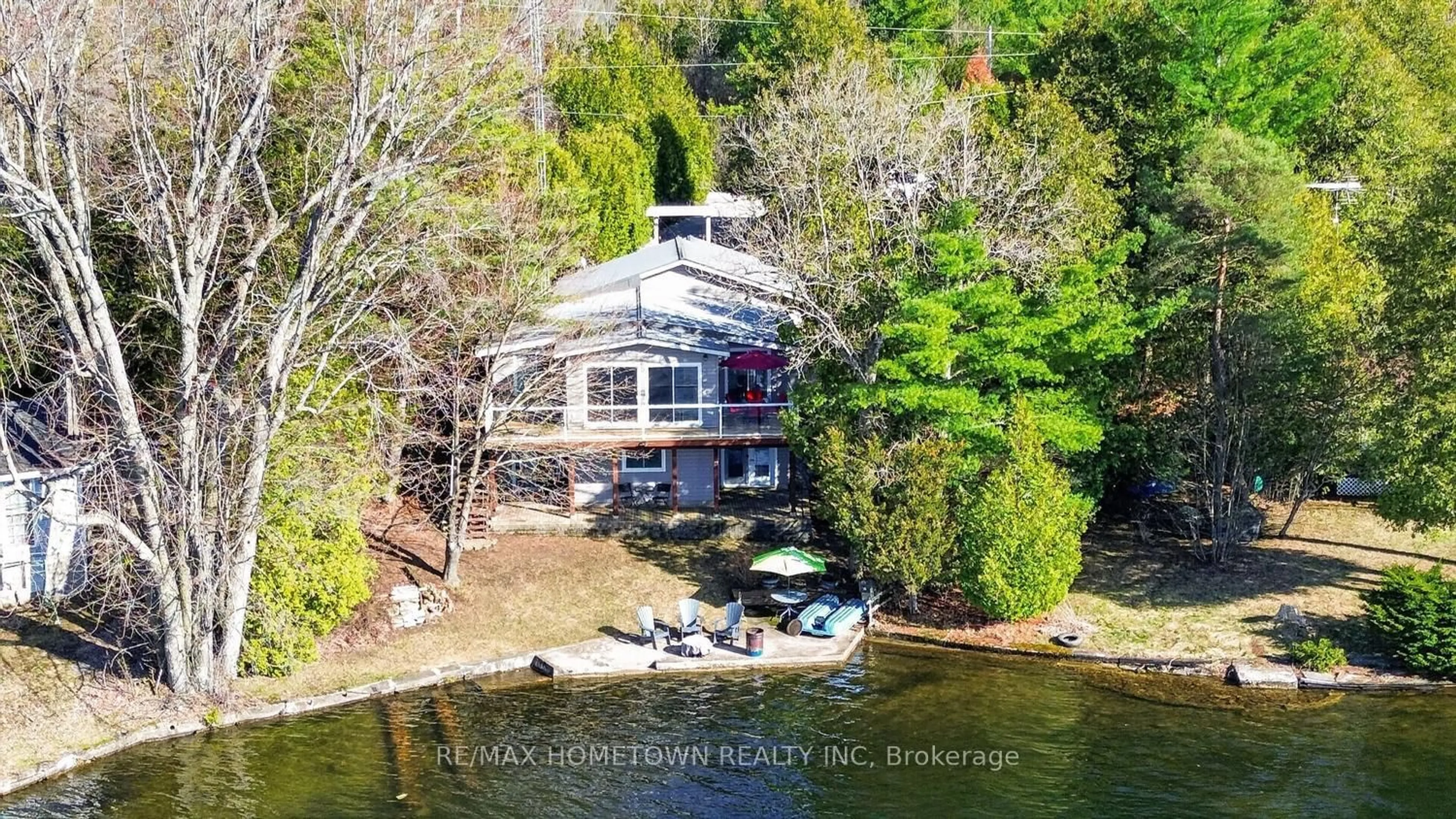 A pic from outside/outdoor area/front of a property/back of a property/a pic from drone, water/lake/river/ocean view for 24 Chant Terr, Front of Yonge Ontario K0E 1R0