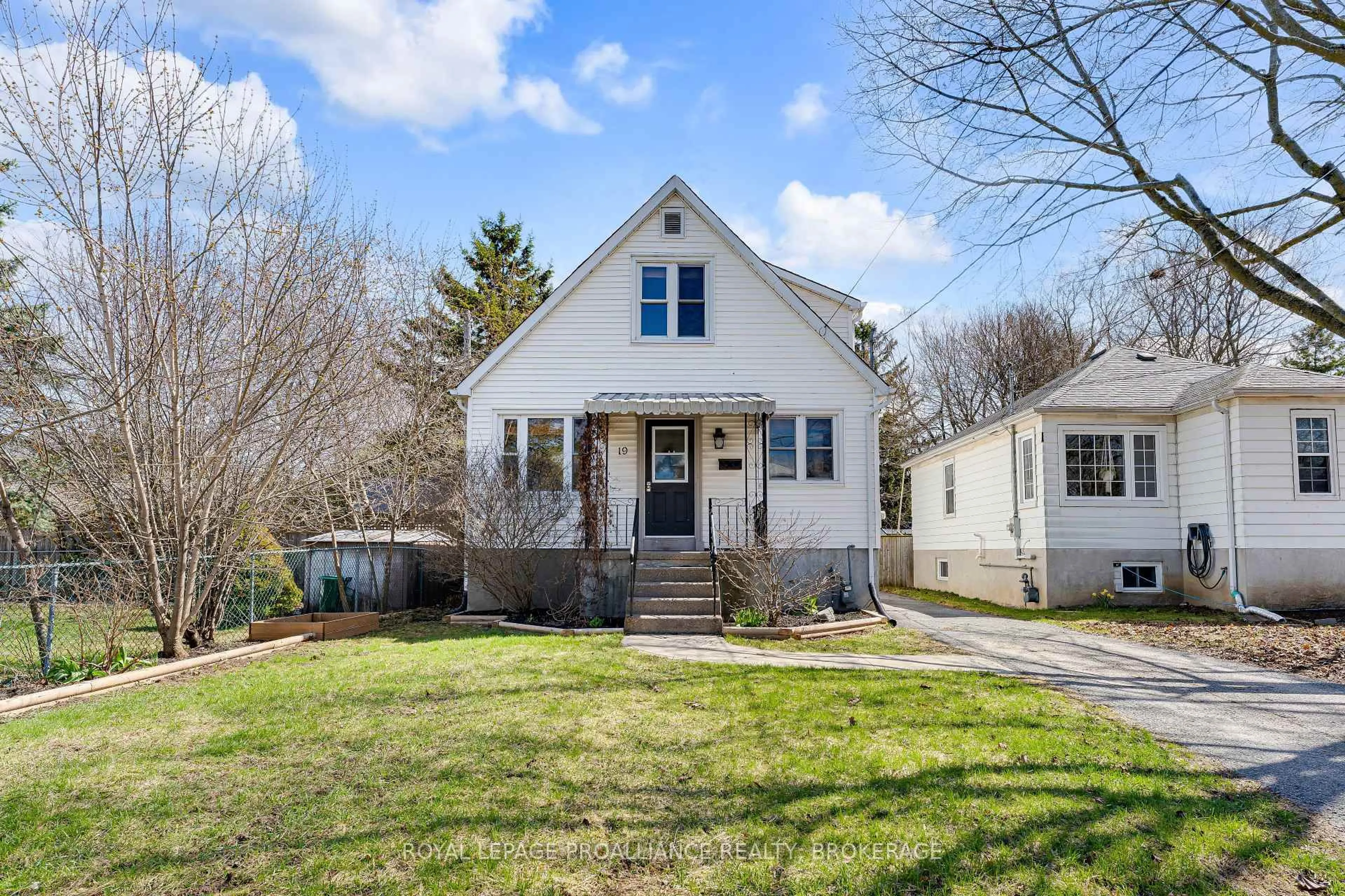 Home with vinyl exterior material, street for 19 Westdale Ave, Kingston Ontario K7L 4S1