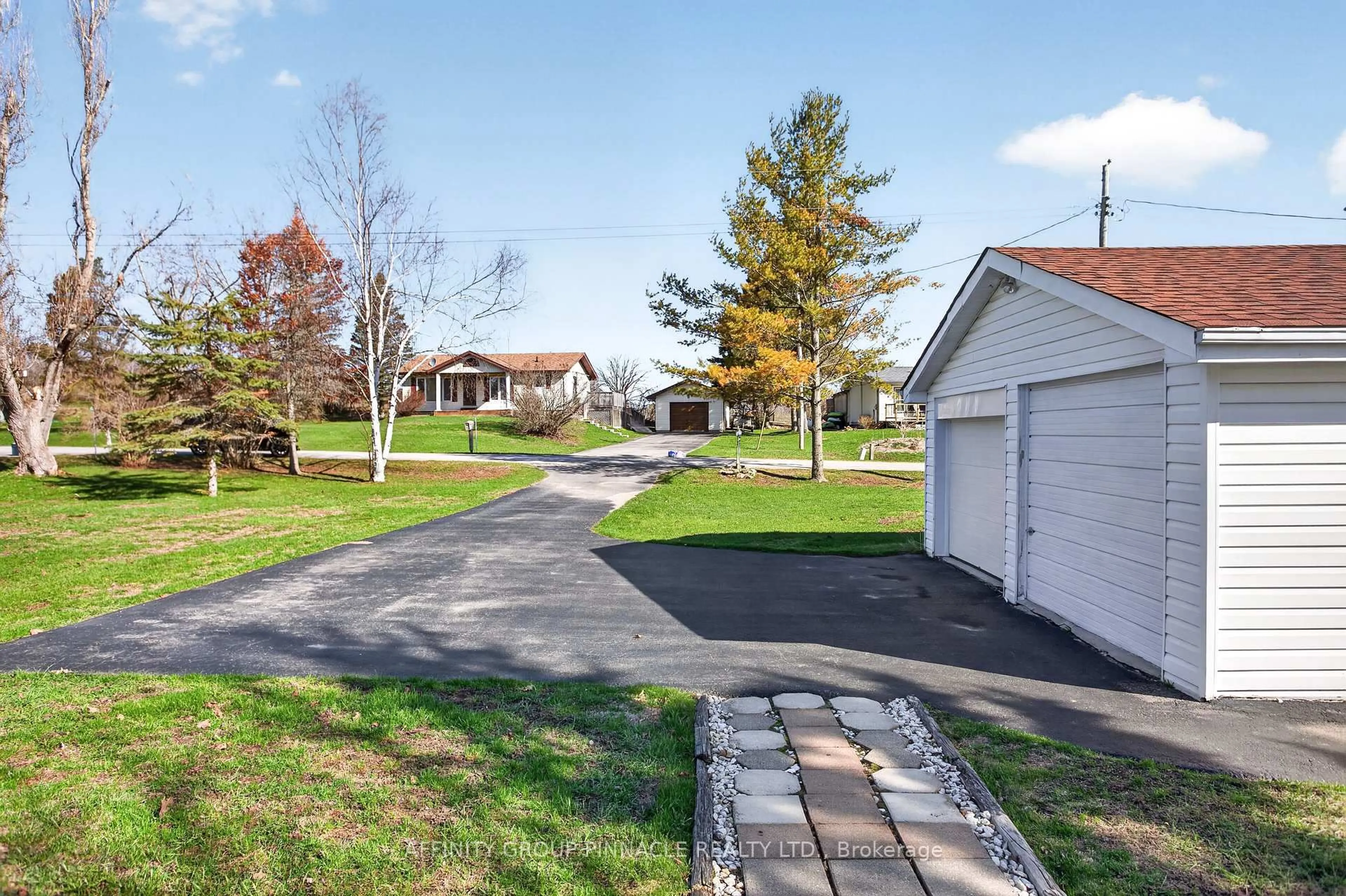 A pic from outside/outdoor area/front of a property/back of a property/a pic from drone, street for 12 North Bayou Rd, Kawartha Lakes Ontario K0M 1N0