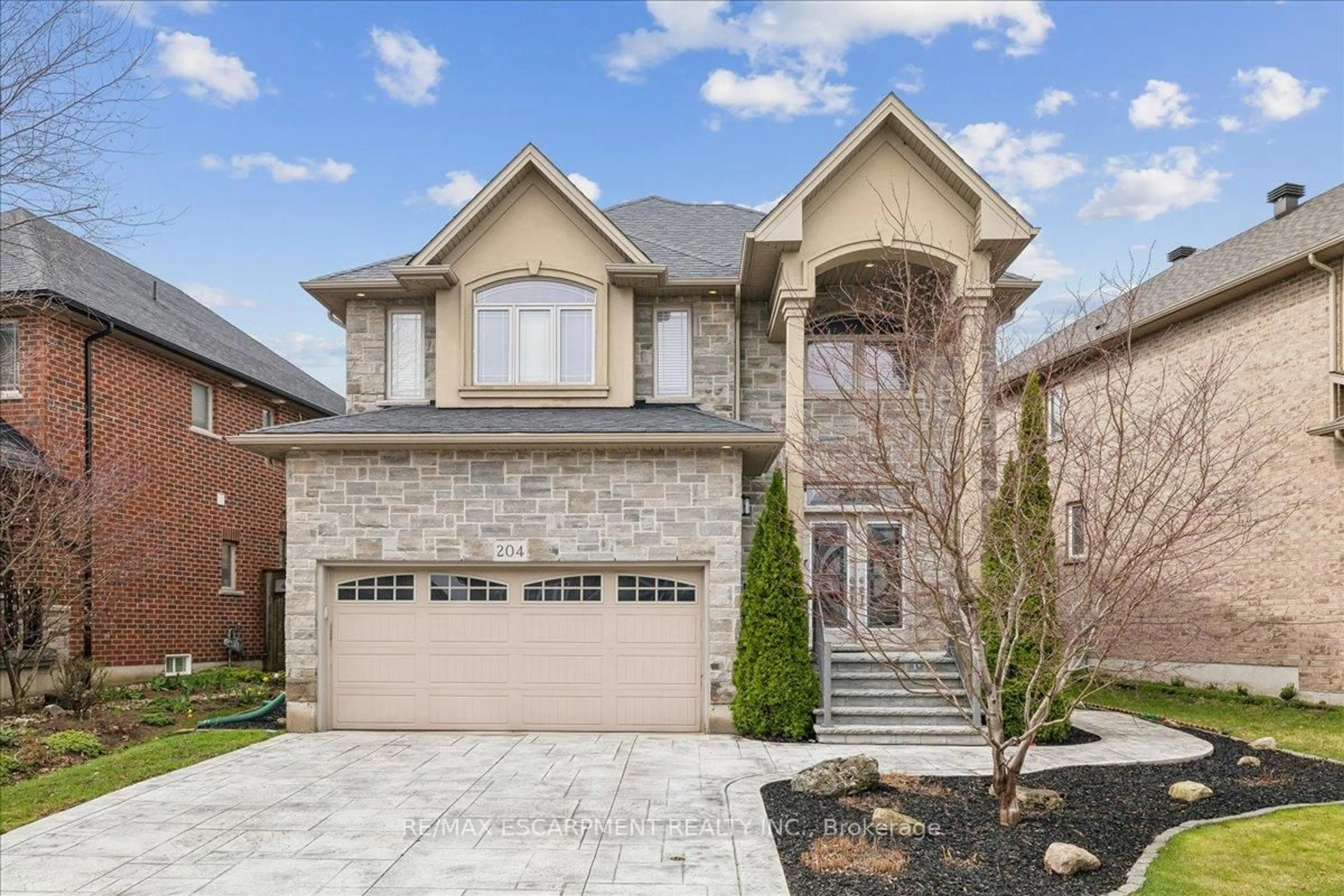 Home with brick exterior material, street for 204 Vinton Rd, Hamilton Ontario L9K 0G8