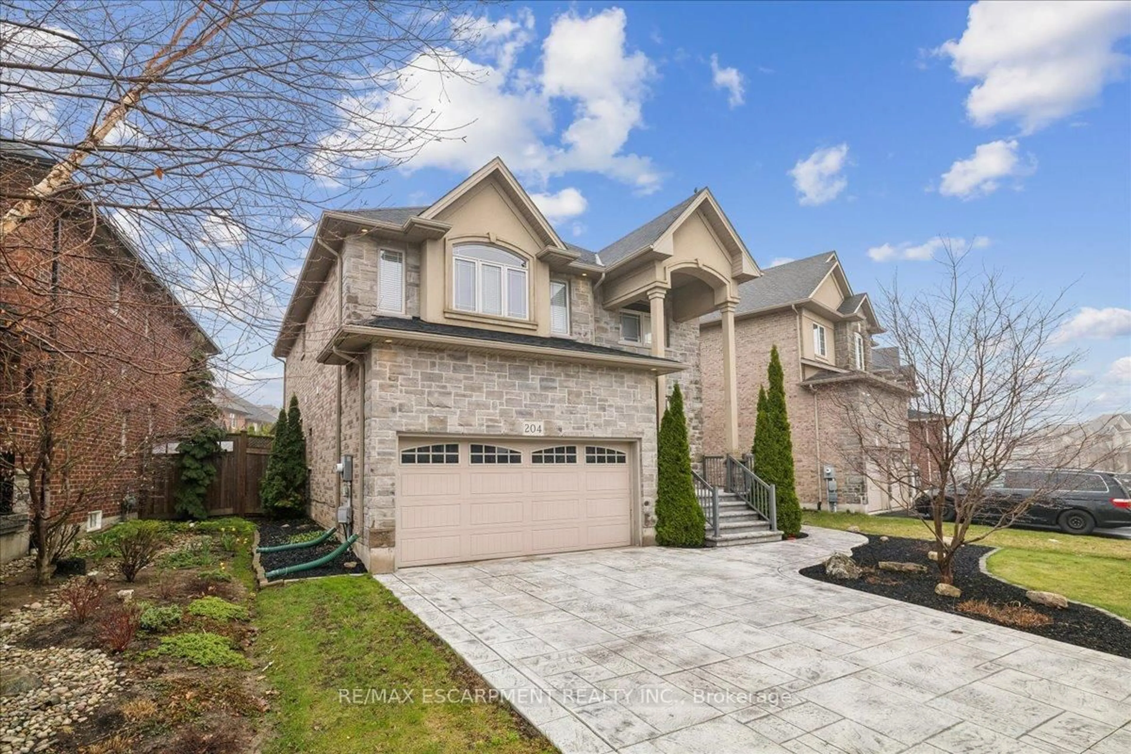 Home with brick exterior material, street for 204 Vinton Rd, Hamilton Ontario L9K 0G8