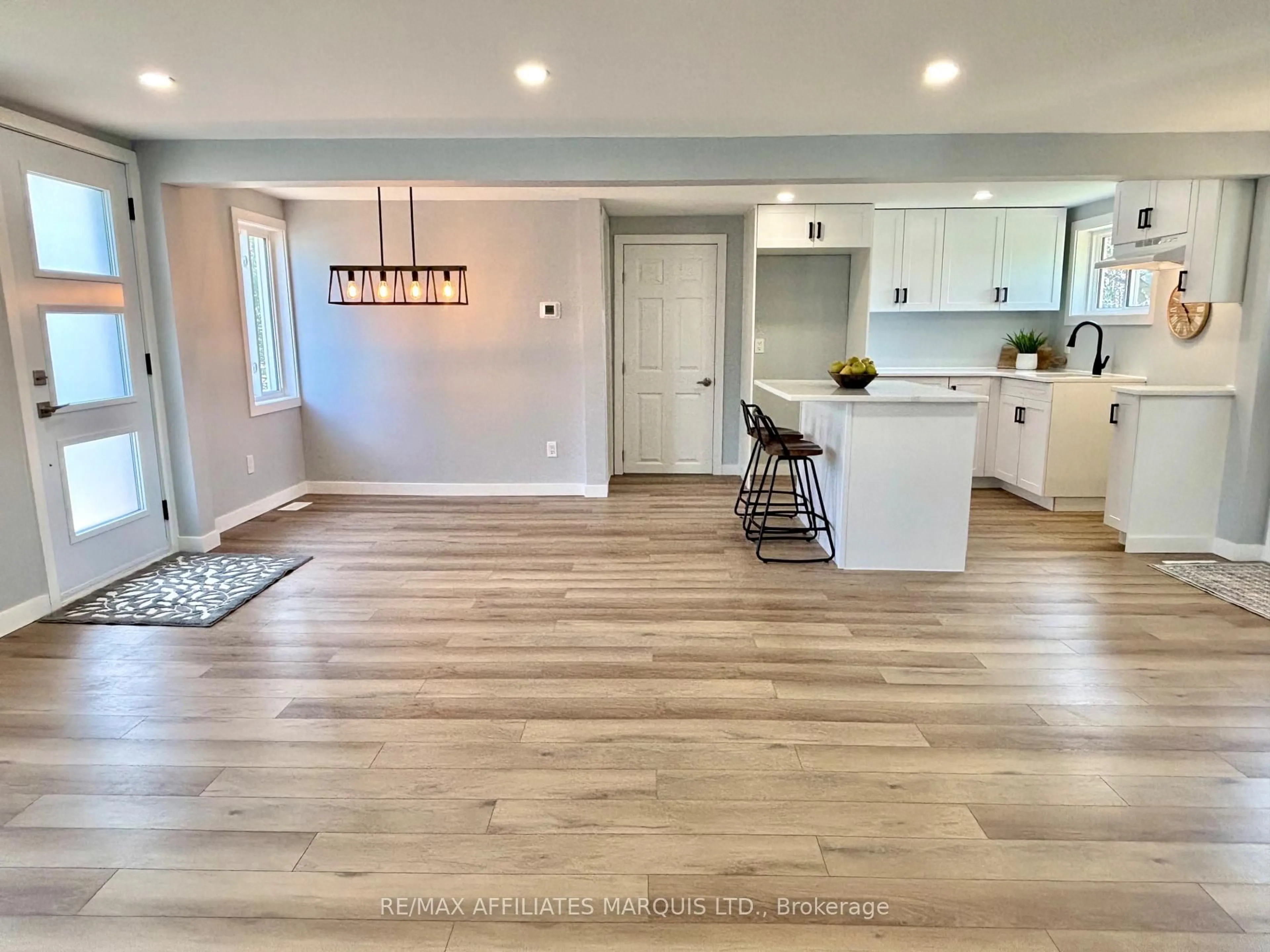 Open concept kitchen, wood/laminate floor for 19 Alexander St, North Glengarry Ontario K0C 1T0
