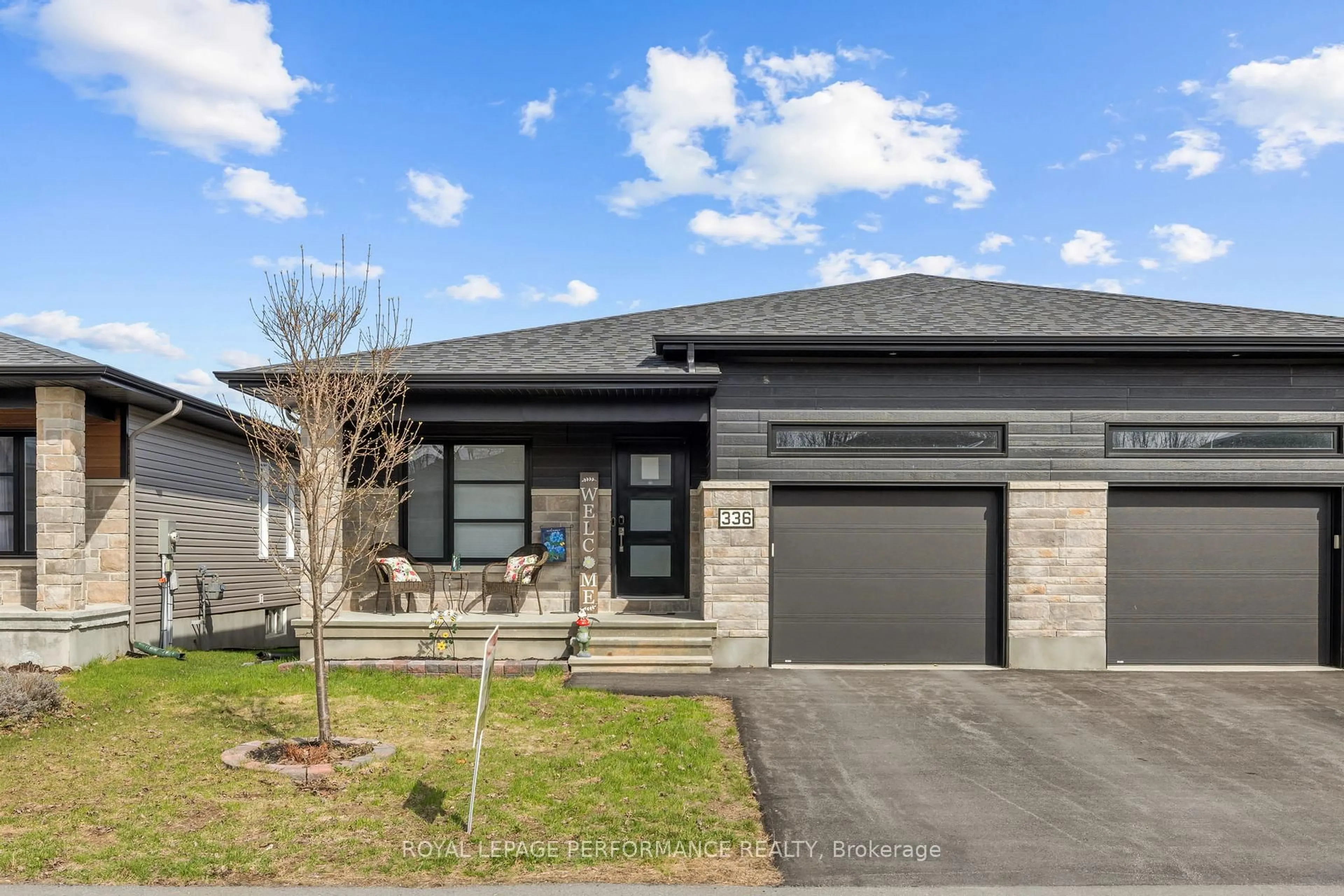 Home with brick exterior material, street for 336 Moisson St, Russell Ontario K0A 1W0