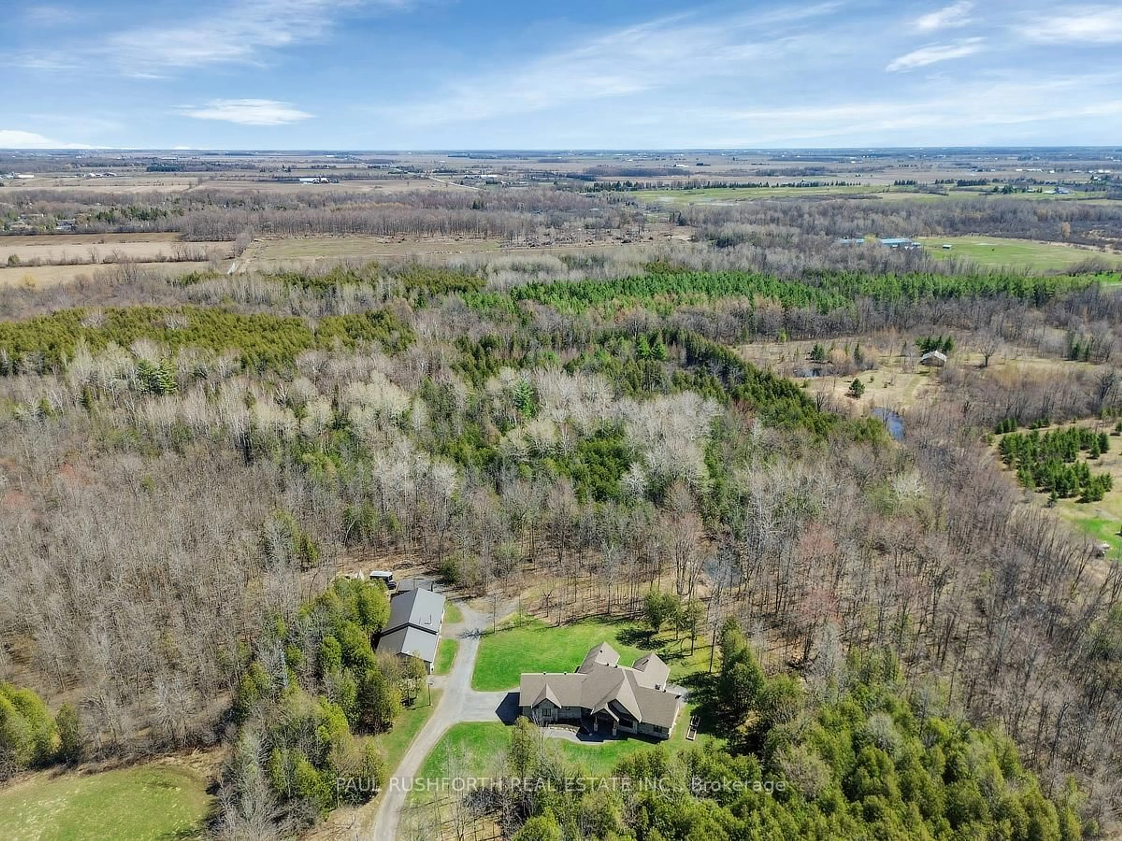 A pic from outside/outdoor area/front of a property/back of a property/a pic from drone, forest/trees view for 1385 Merkley Rd, North Dundas Ontario K0C 2K0