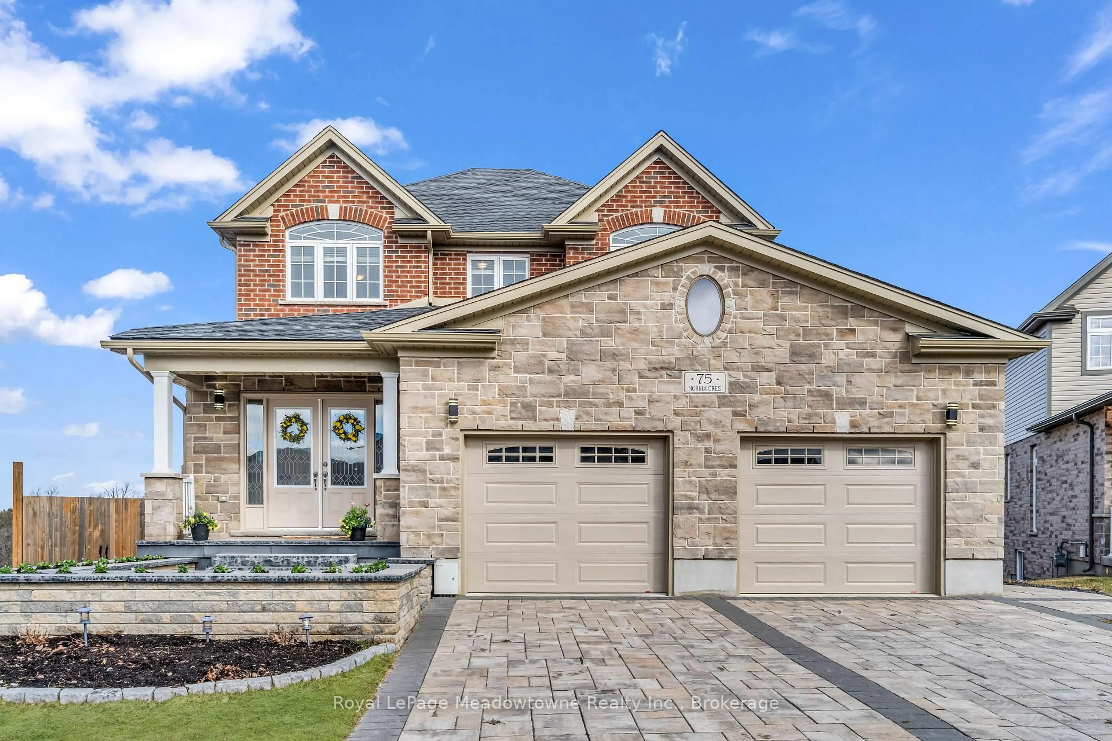 Home with brick exterior material, street for 75 Norma Cres, Guelph Ontario N1E 0K6