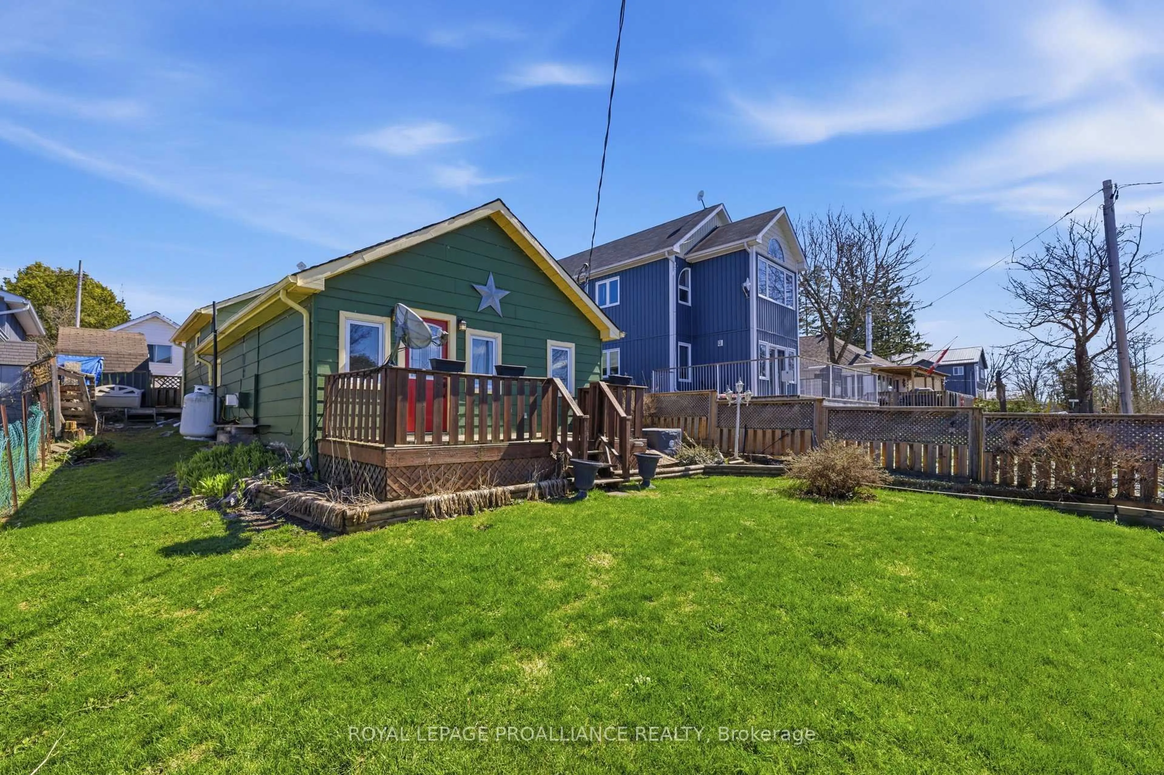 A pic from outside/outdoor area/front of a property/back of a property/a pic from drone, water/lake/river/ocean view for 5469 Lakeshore Dr, Hamilton Township Ontario K0K 2H0