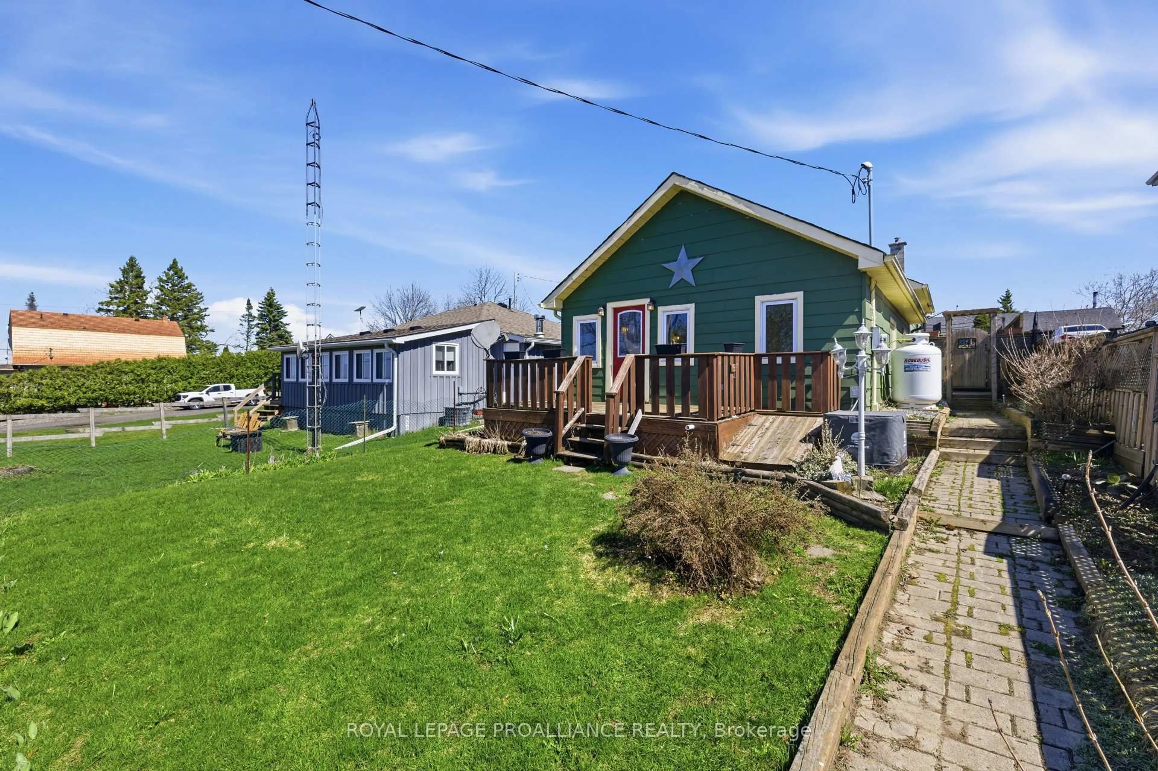 A pic from outside/outdoor area/front of a property/back of a property/a pic from drone, street for 5469 Lakeshore Dr, Hamilton Township Ontario K0K 2H0