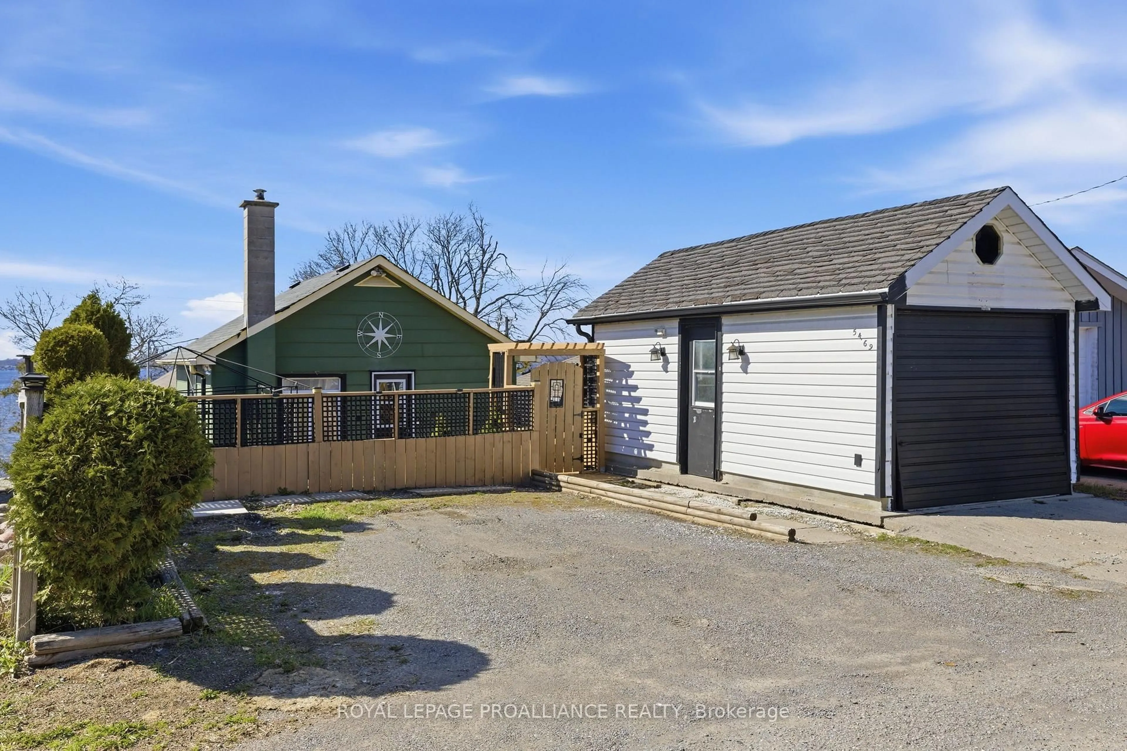 A pic from outside/outdoor area/front of a property/back of a property/a pic from drone, street for 5469 Lakeshore Dr, Hamilton Township Ontario K0K 2H0