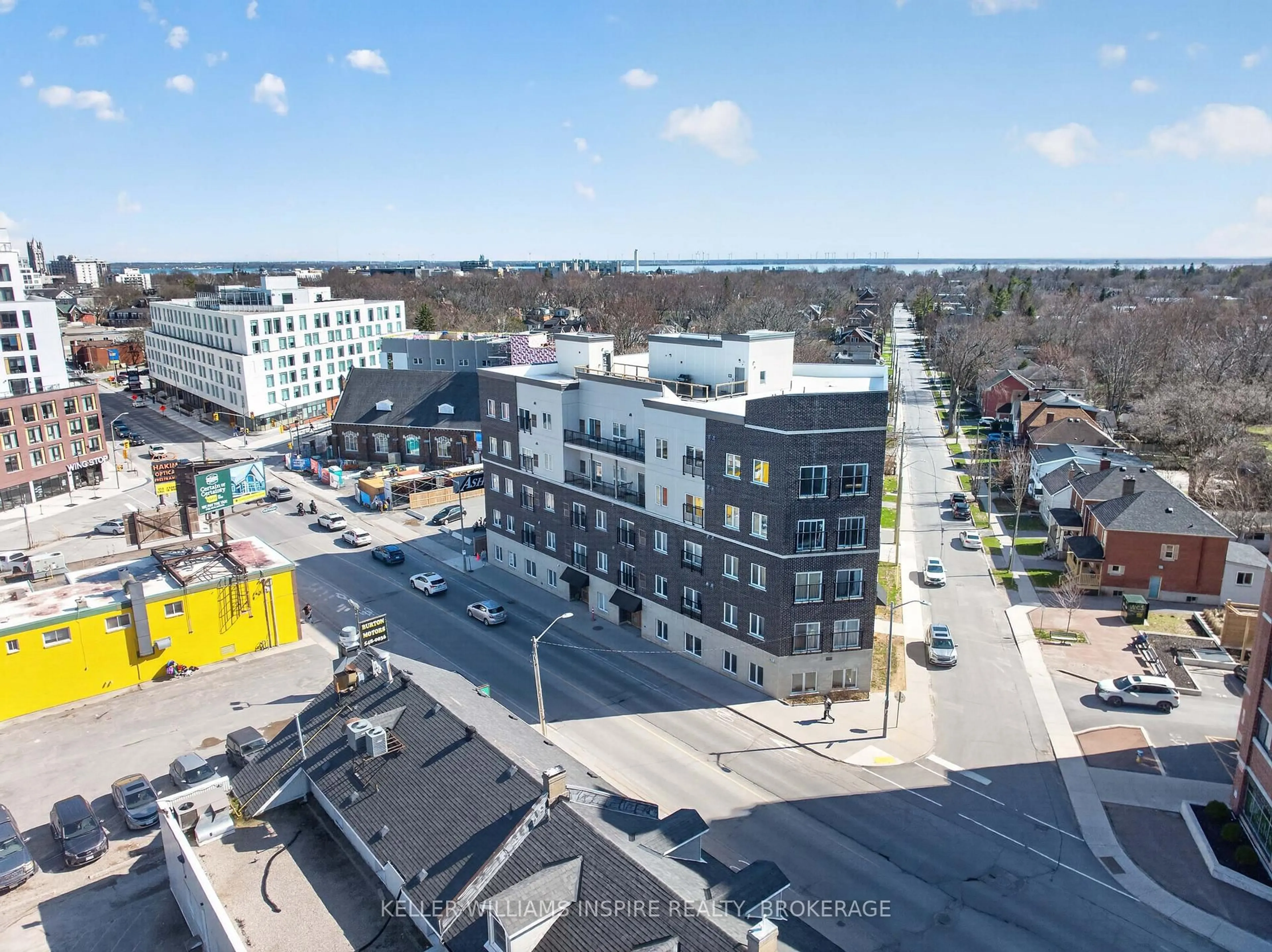 A pic from outside/outdoor area/front of a property/back of a property/a pic from drone, city buildings view from balcony for 630 Princess St #207, Kingston Ontario K7L 1E2