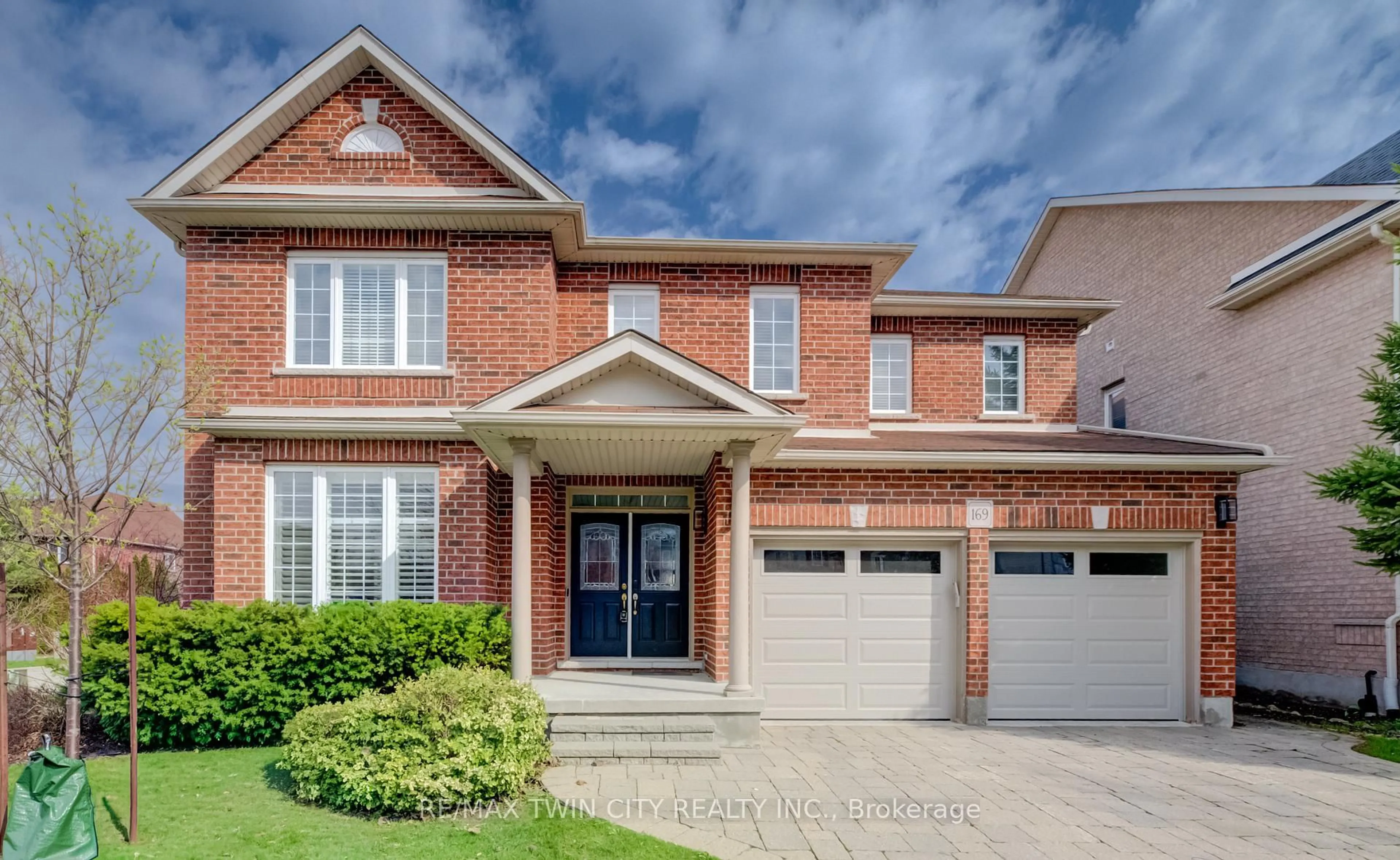 Home with brick exterior material, street for 169 Falconridge Dr, Kitchener Ontario N2K 4J9